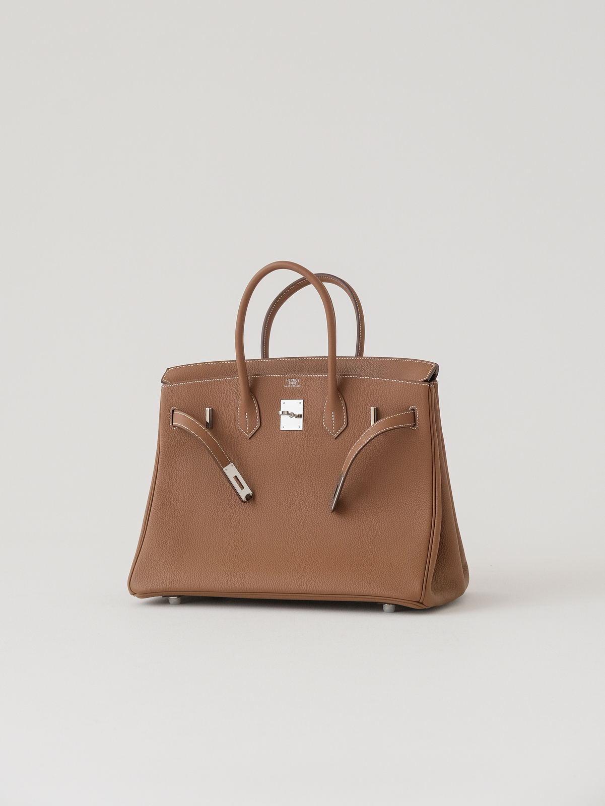 Hermes Birkin gold brown gold buckle