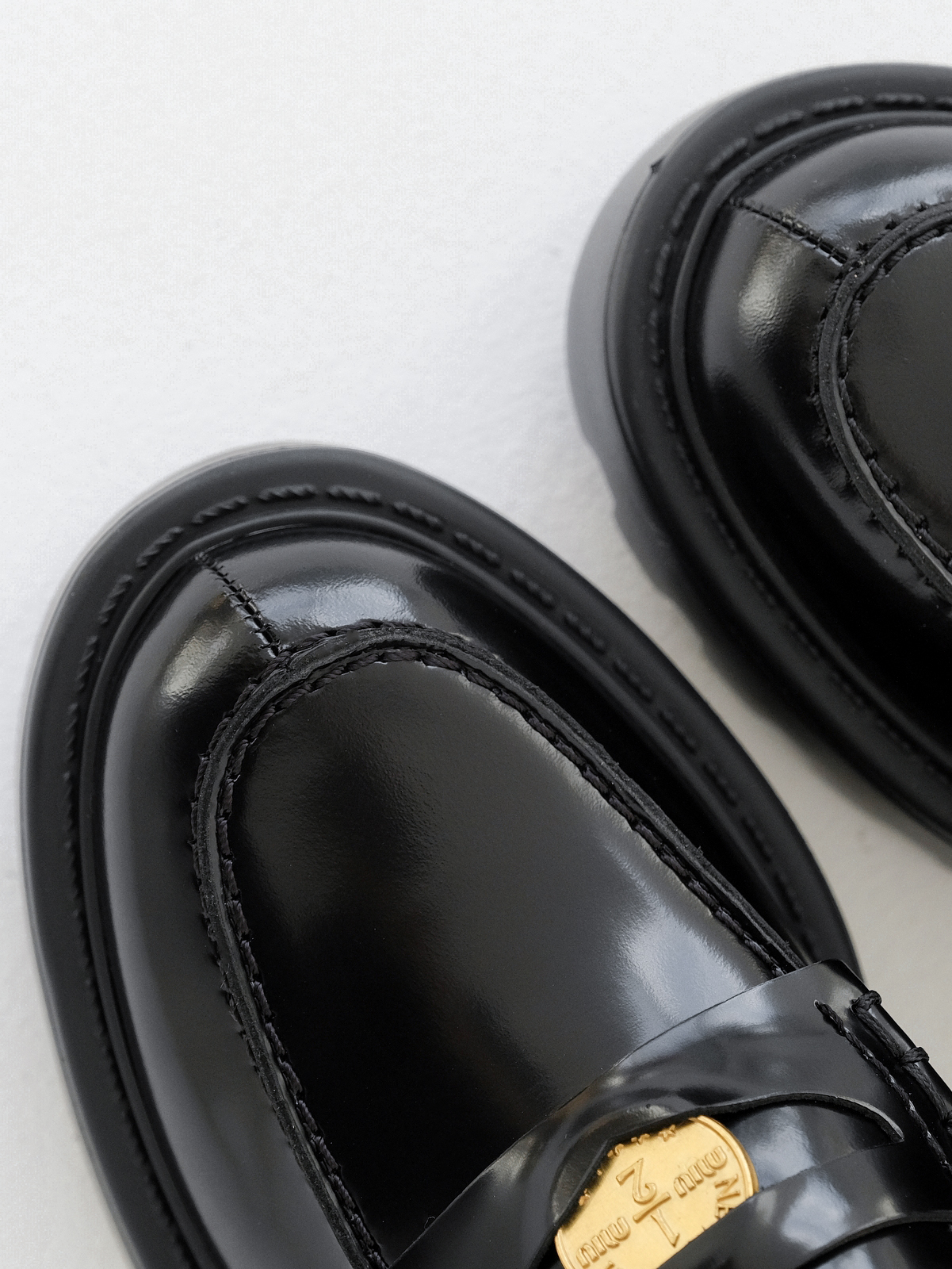 Miumiu thick-soled coin loafers