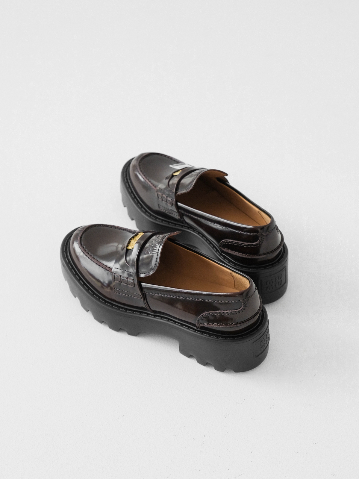 Miumiu thick-soled coin loafers