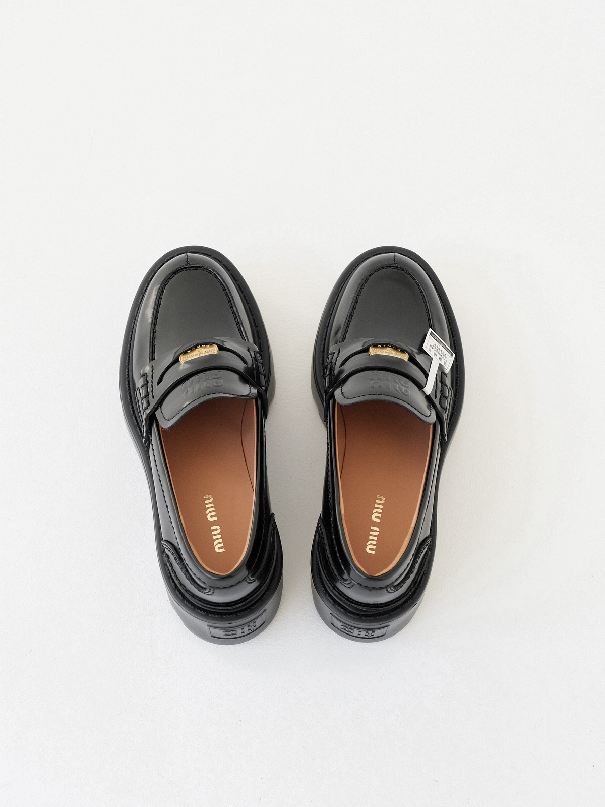 Miumiu thick-soled coin loafers