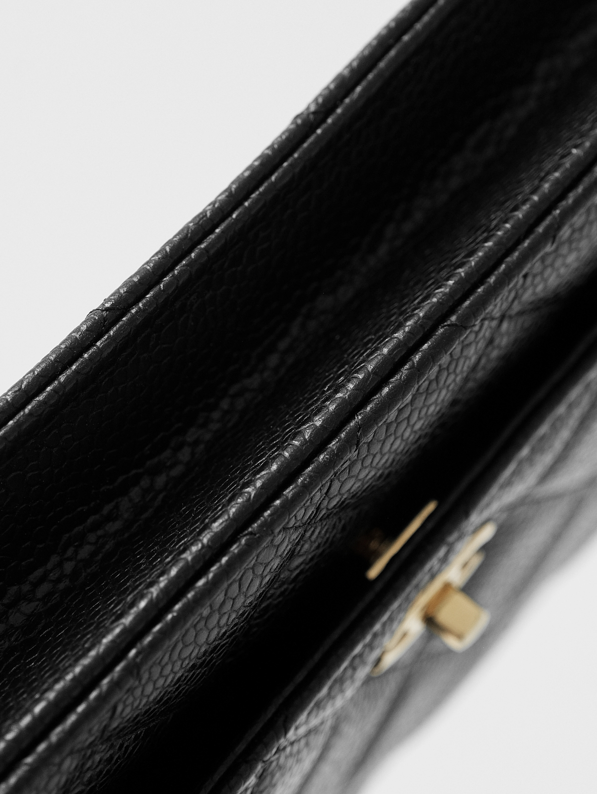 Black caviar gold buckle