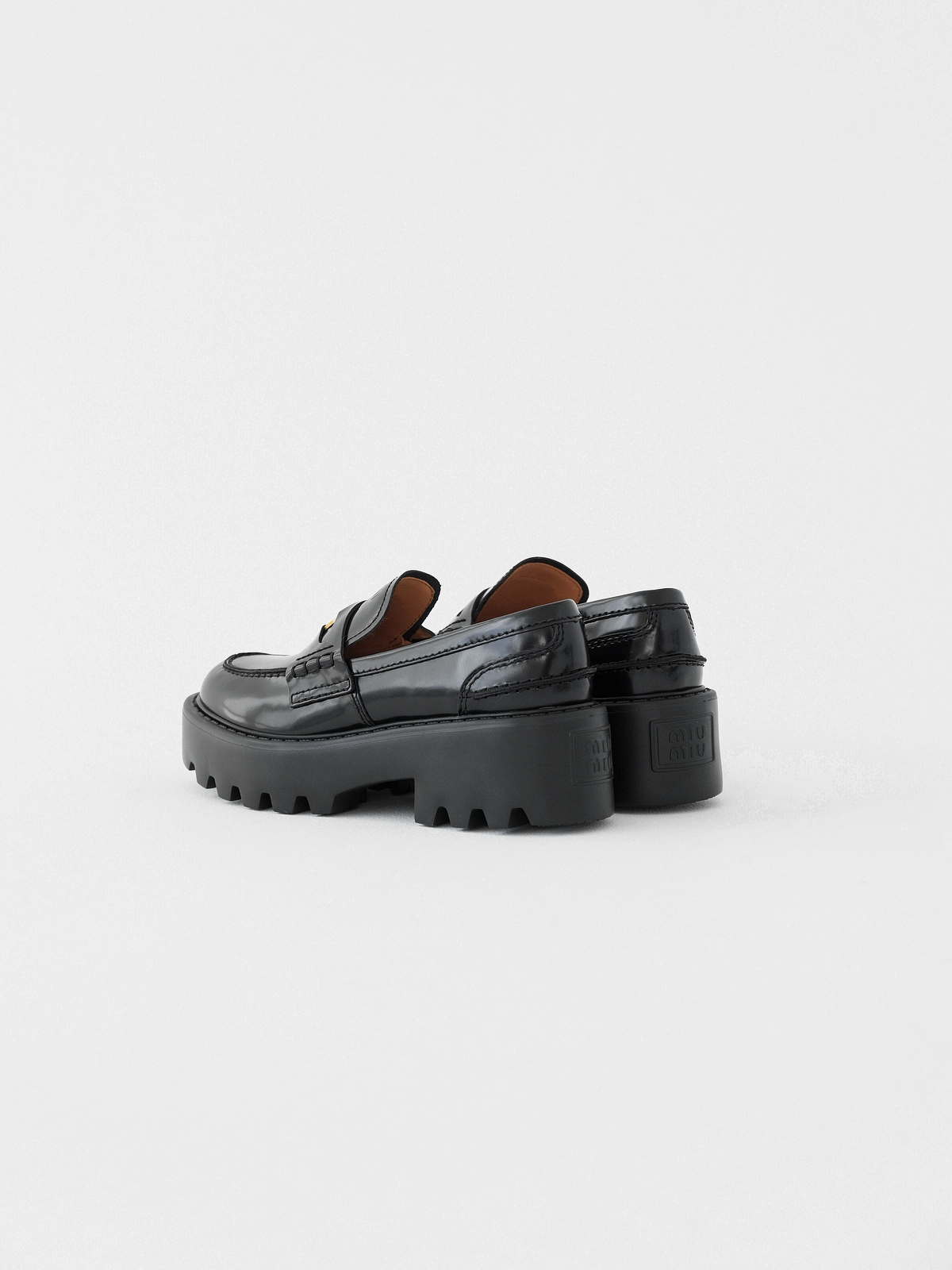 Miumiu thick-soled coin loafers