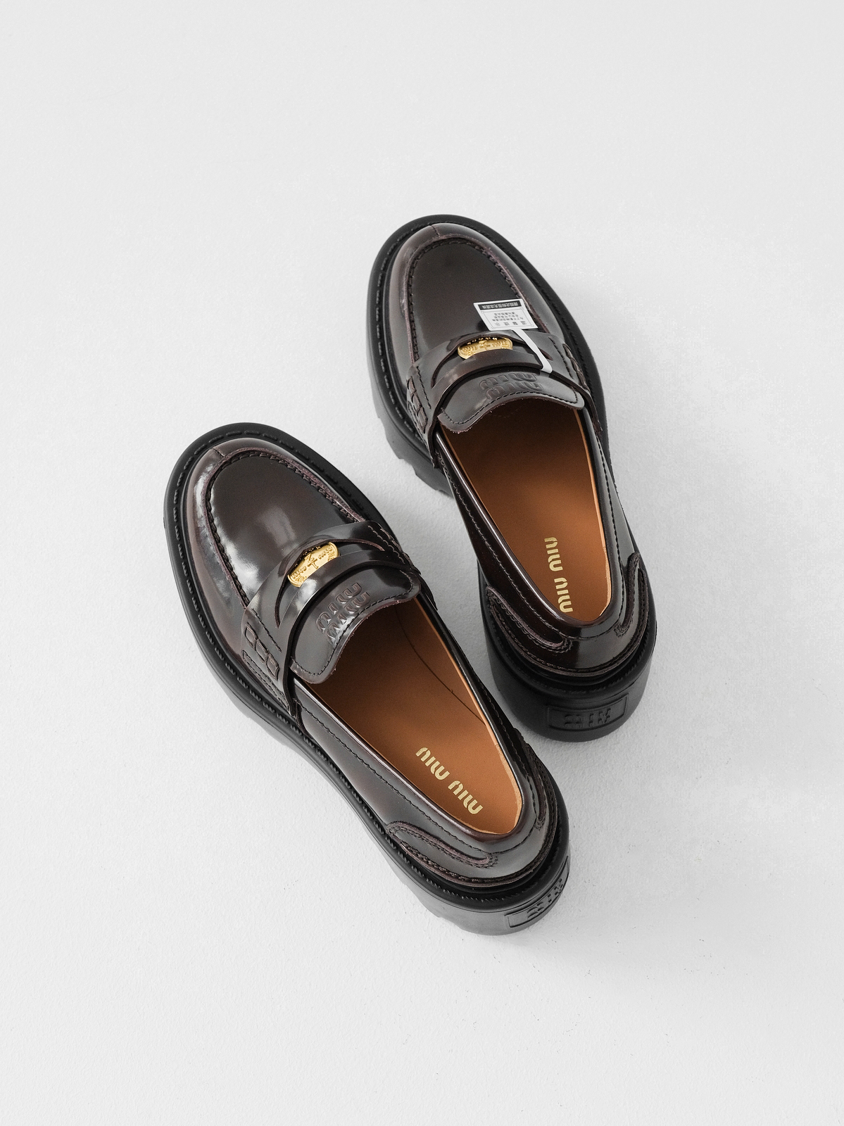 Miumiu thick-soled coin loafers