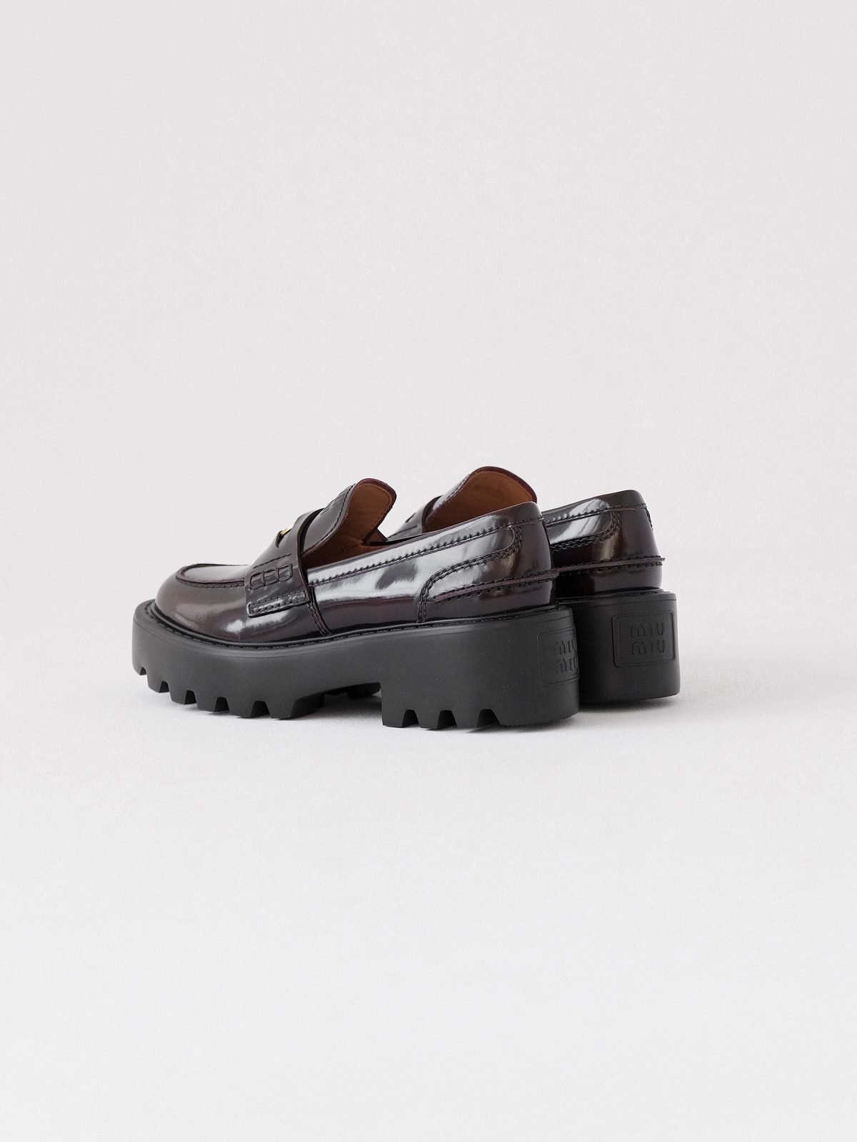 Miumiu thick-soled coin loafers