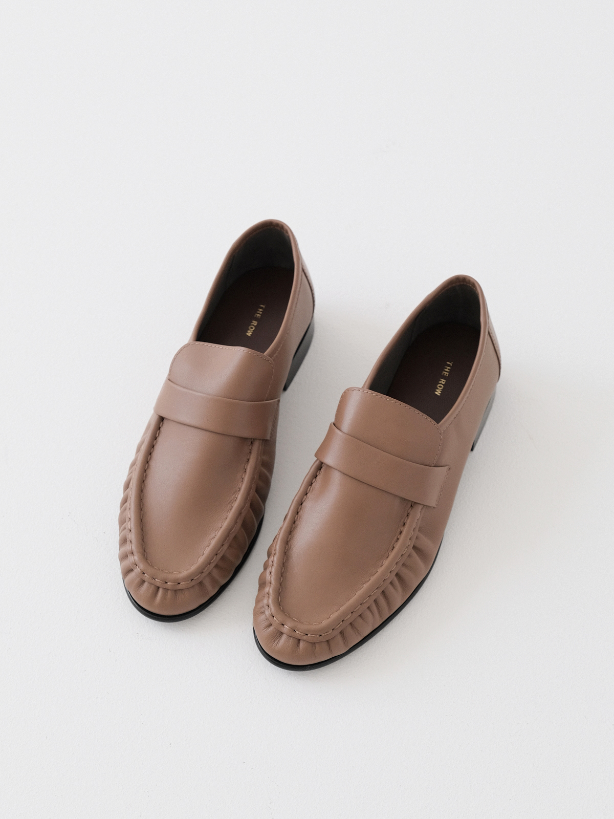 The row super cattle loafers