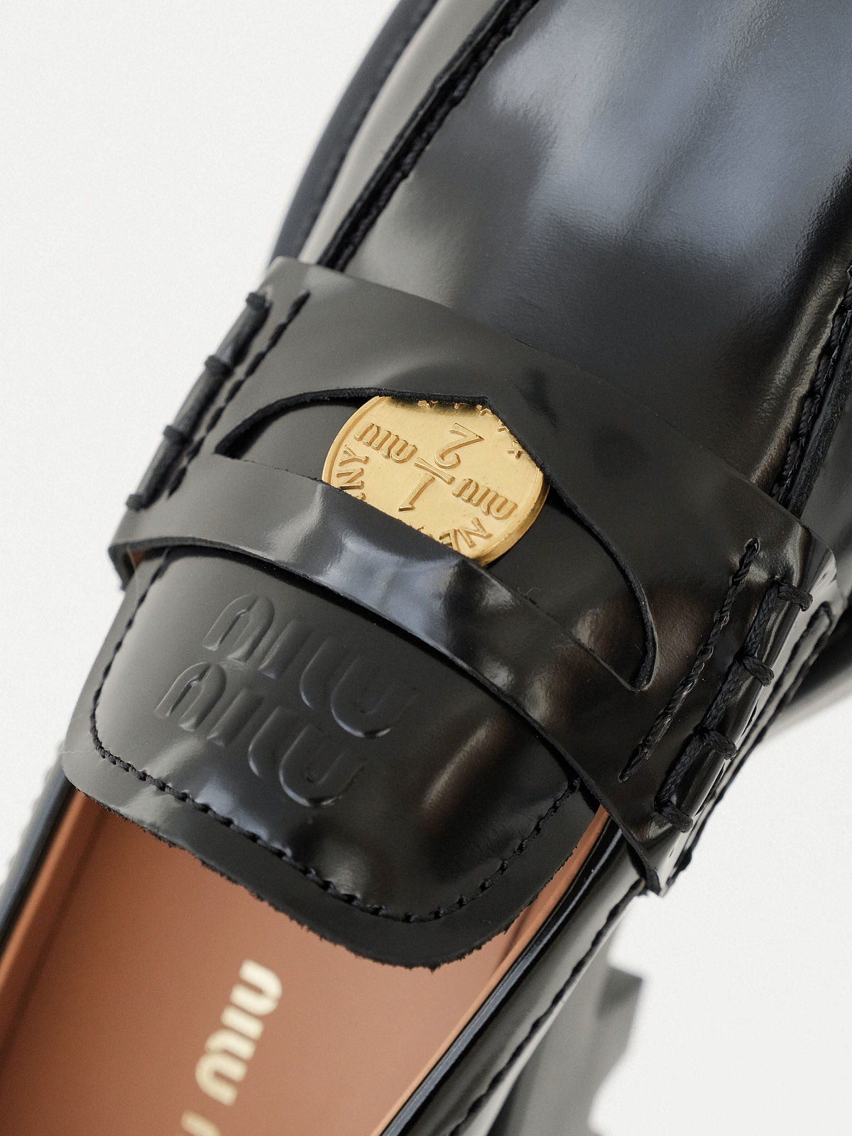 Miumiu thick-soled coin loafers