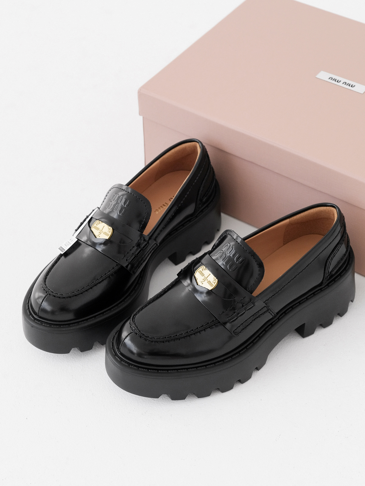 Miumiu thick-soled coin loafers