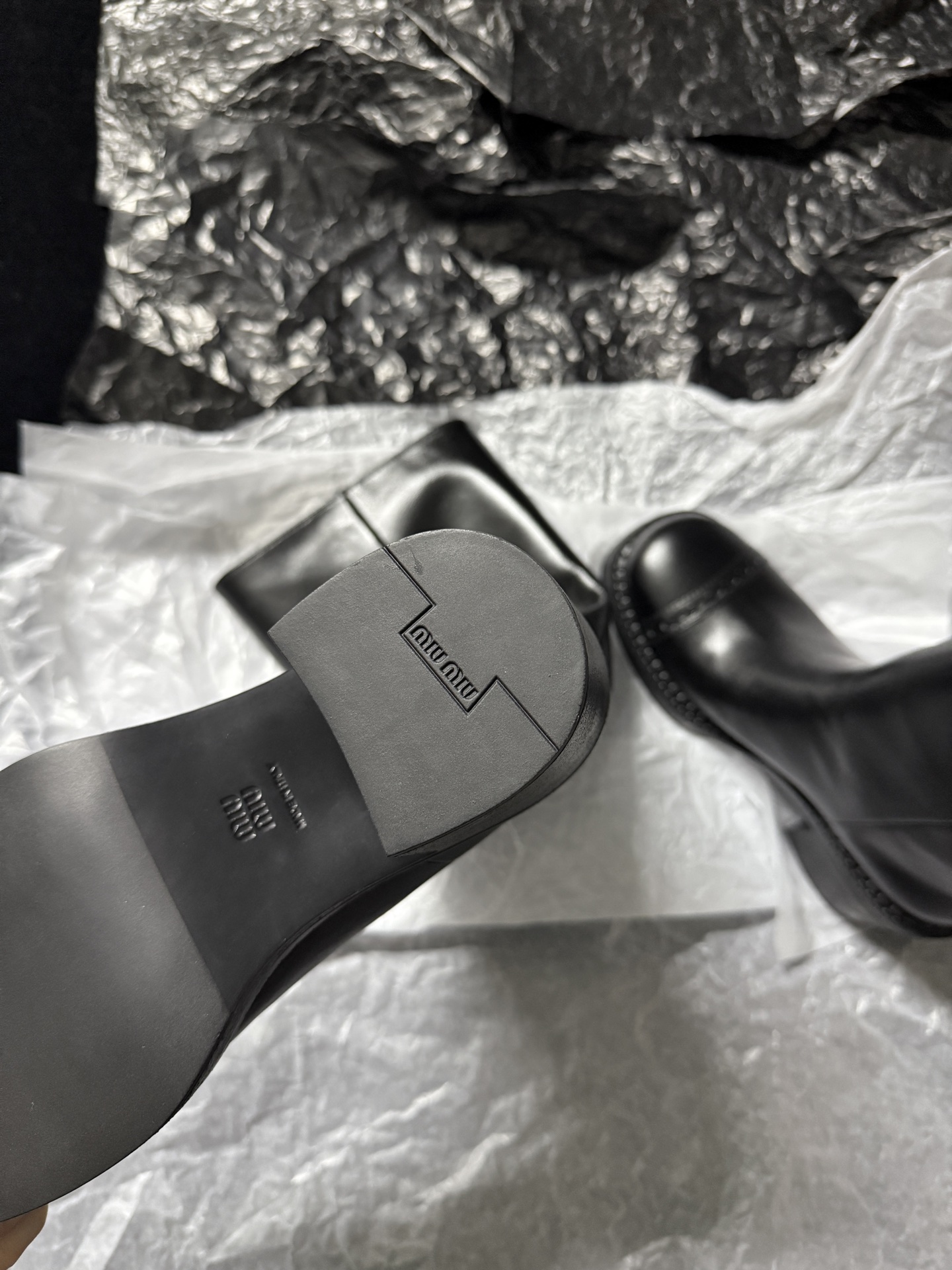 Miu Miu black over-the-knee boots