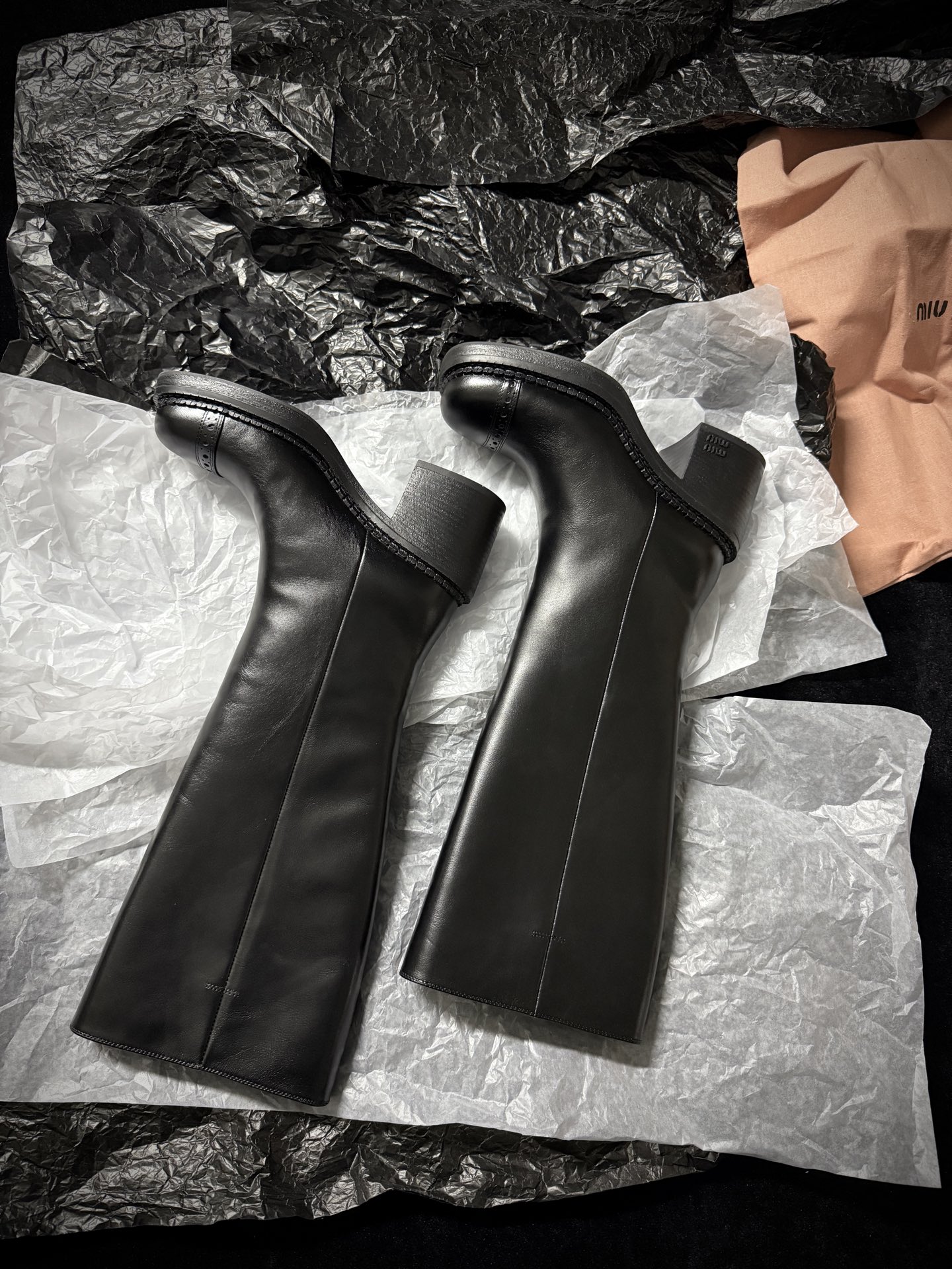 Miu Miu black over-the-knee boots