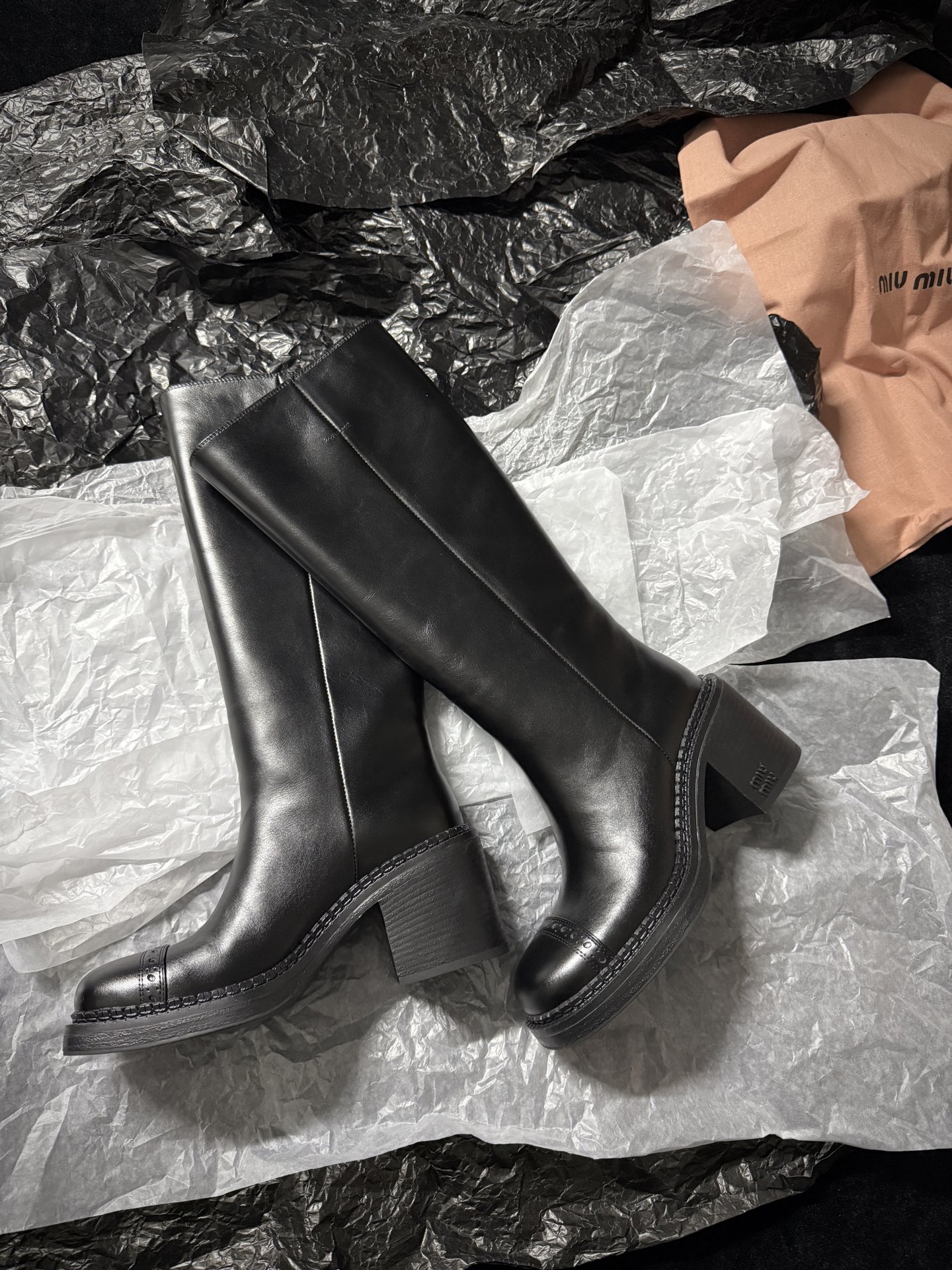 Miu Miu black over-the-knee boots