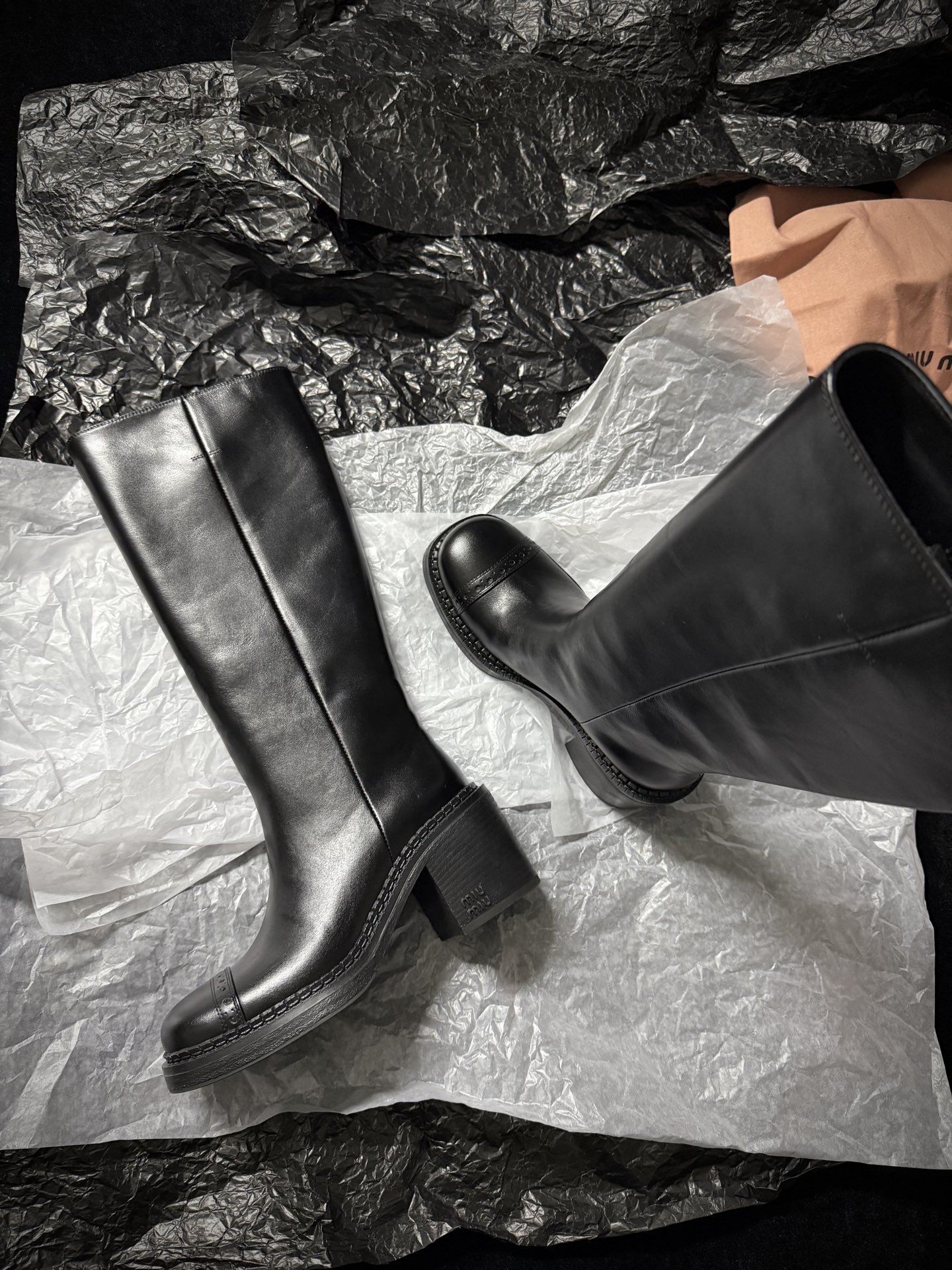 Miu Miu black over-the-knee boots