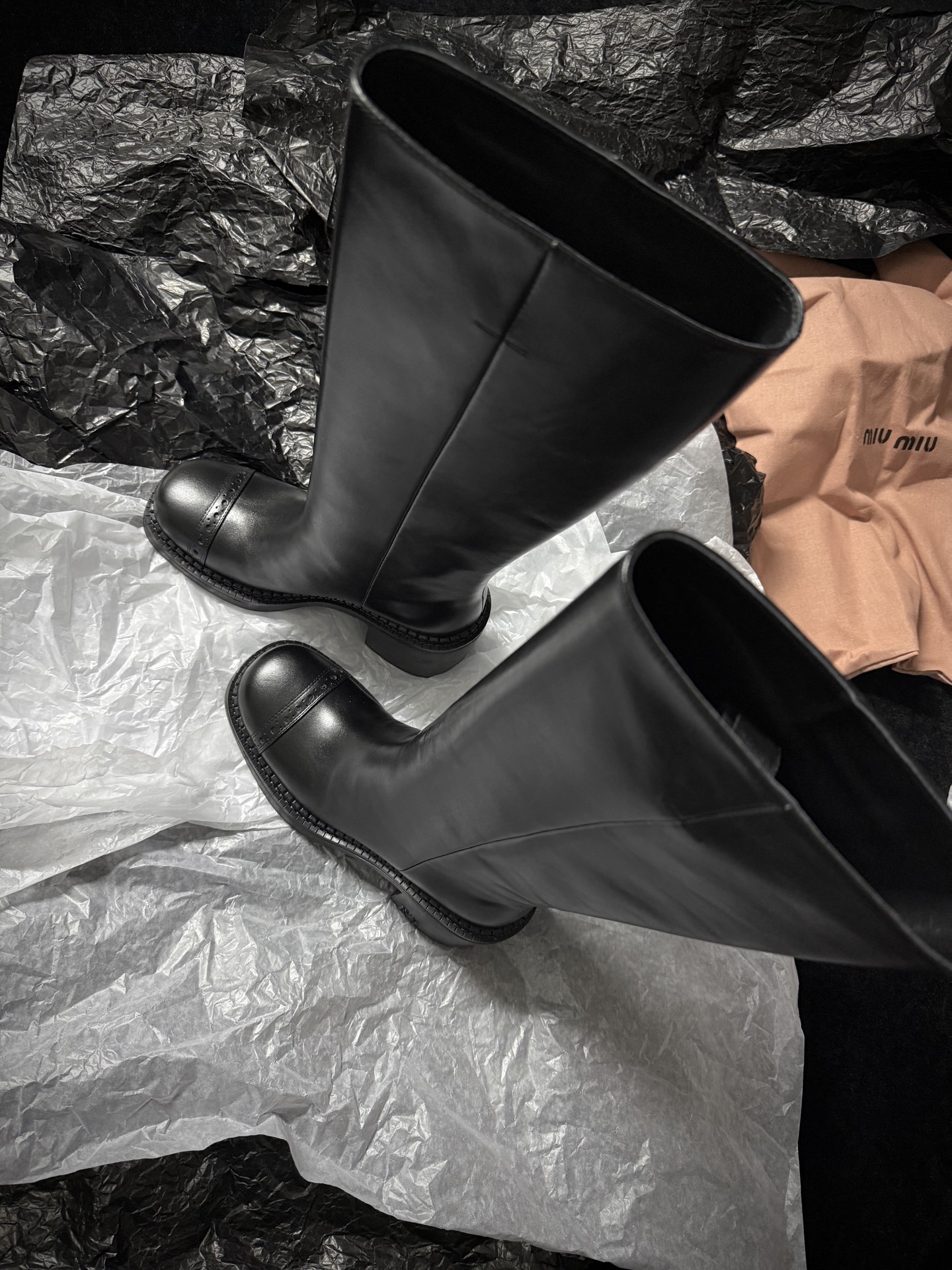 Miu Miu black over-the-knee boots