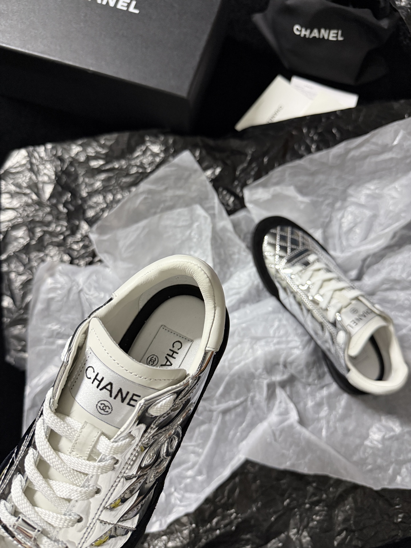 Chanel Silver Wing Sneakers