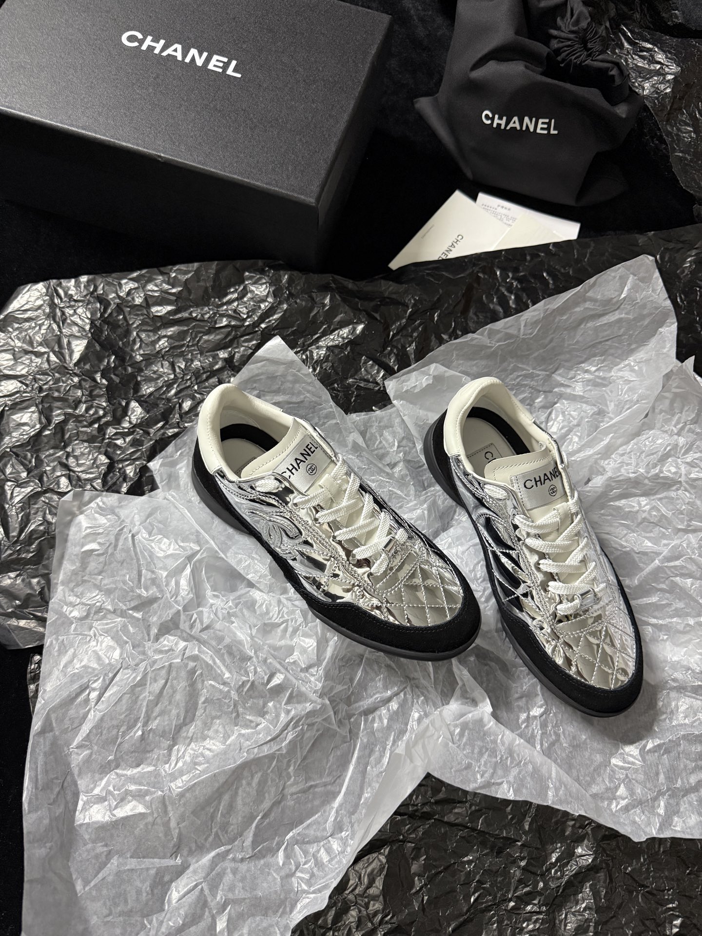 Chanel Silver Wing Sneakers