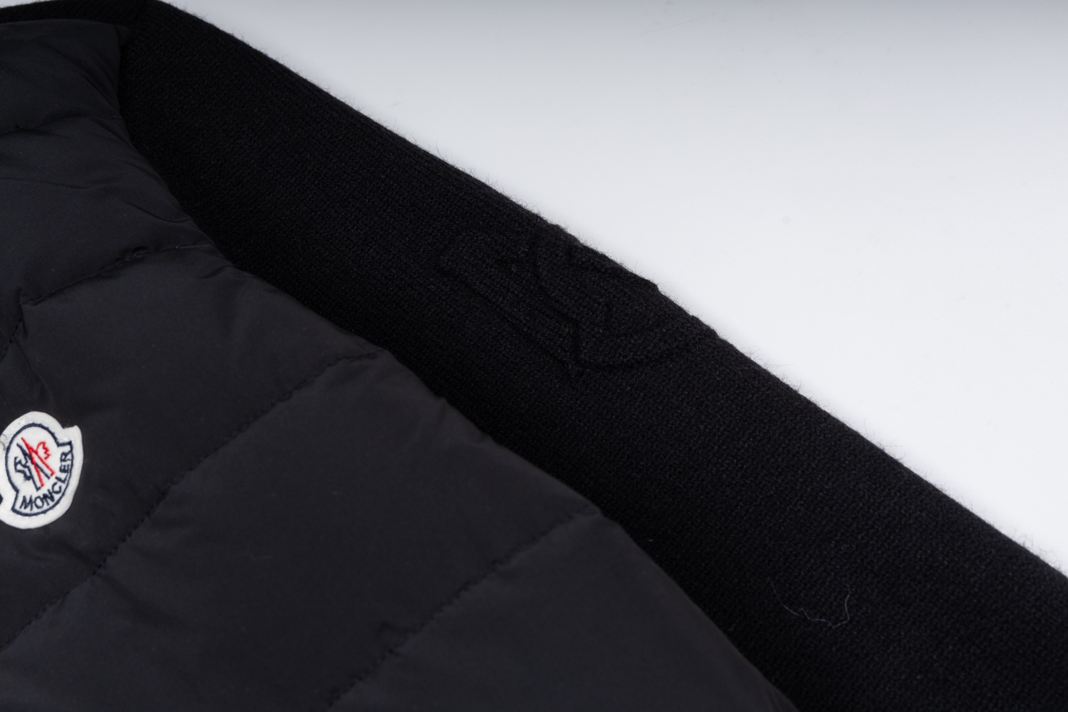 Moncler Small Chest Logo Paneled Knit Stand-Collar Down Jacket