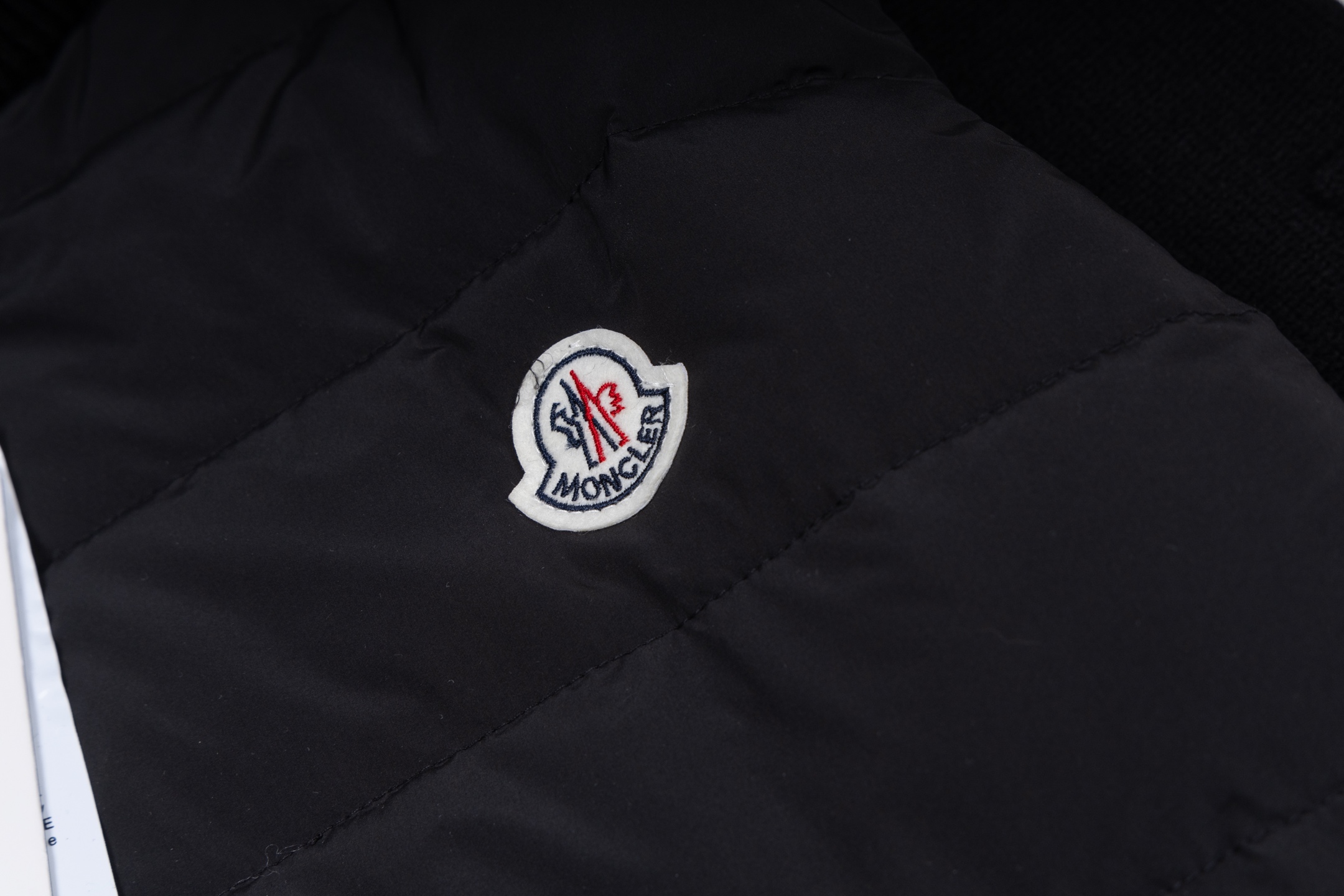 Moncler Small Chest Logo Paneled Knit Stand-Collar Down Jacket