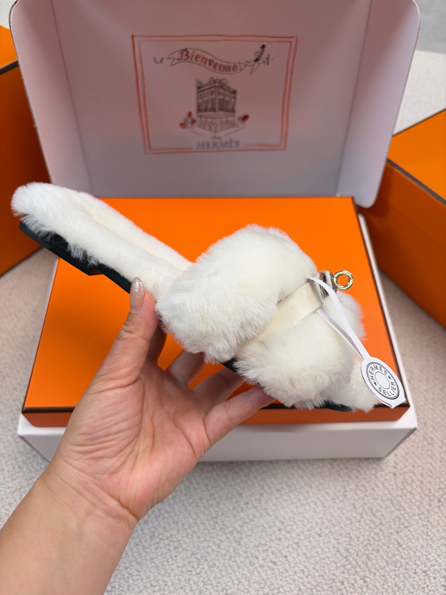 Hermès furry slippers