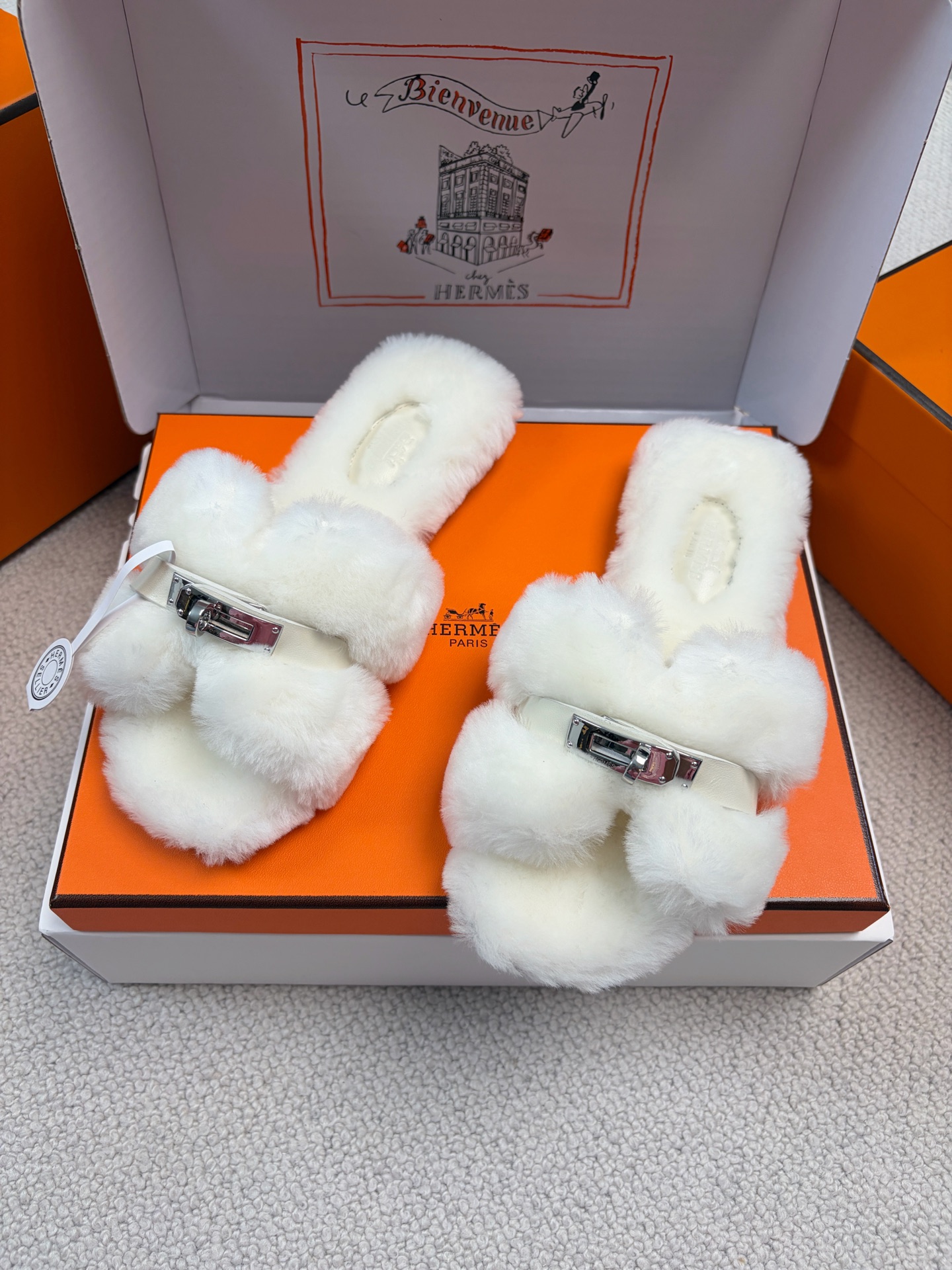 Hermès furry slippers