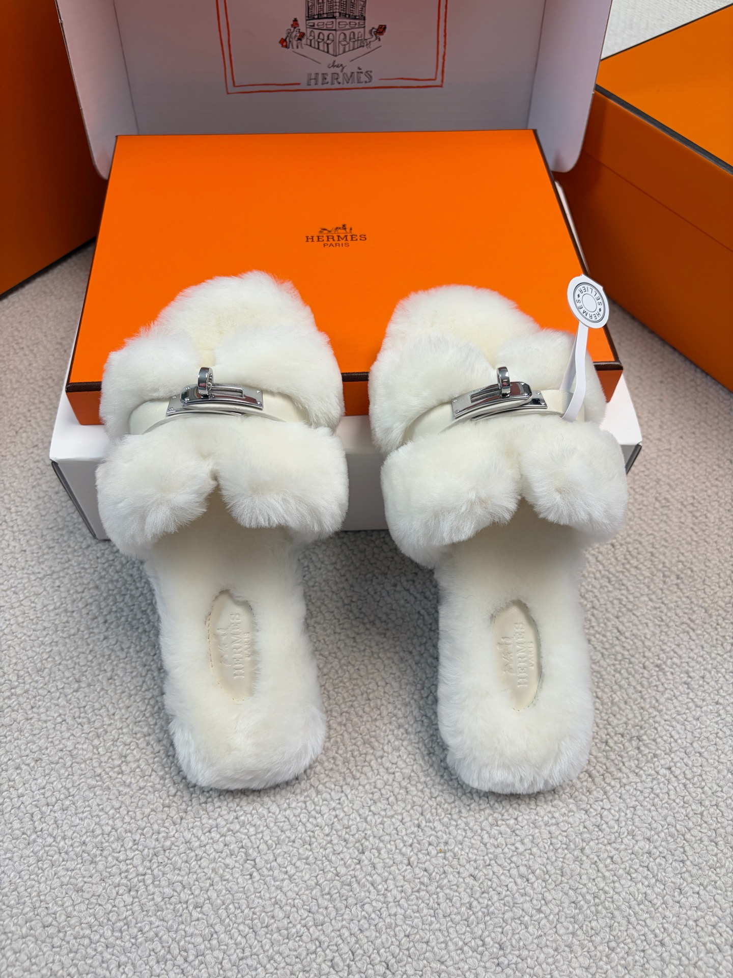 Hermès furry slippers