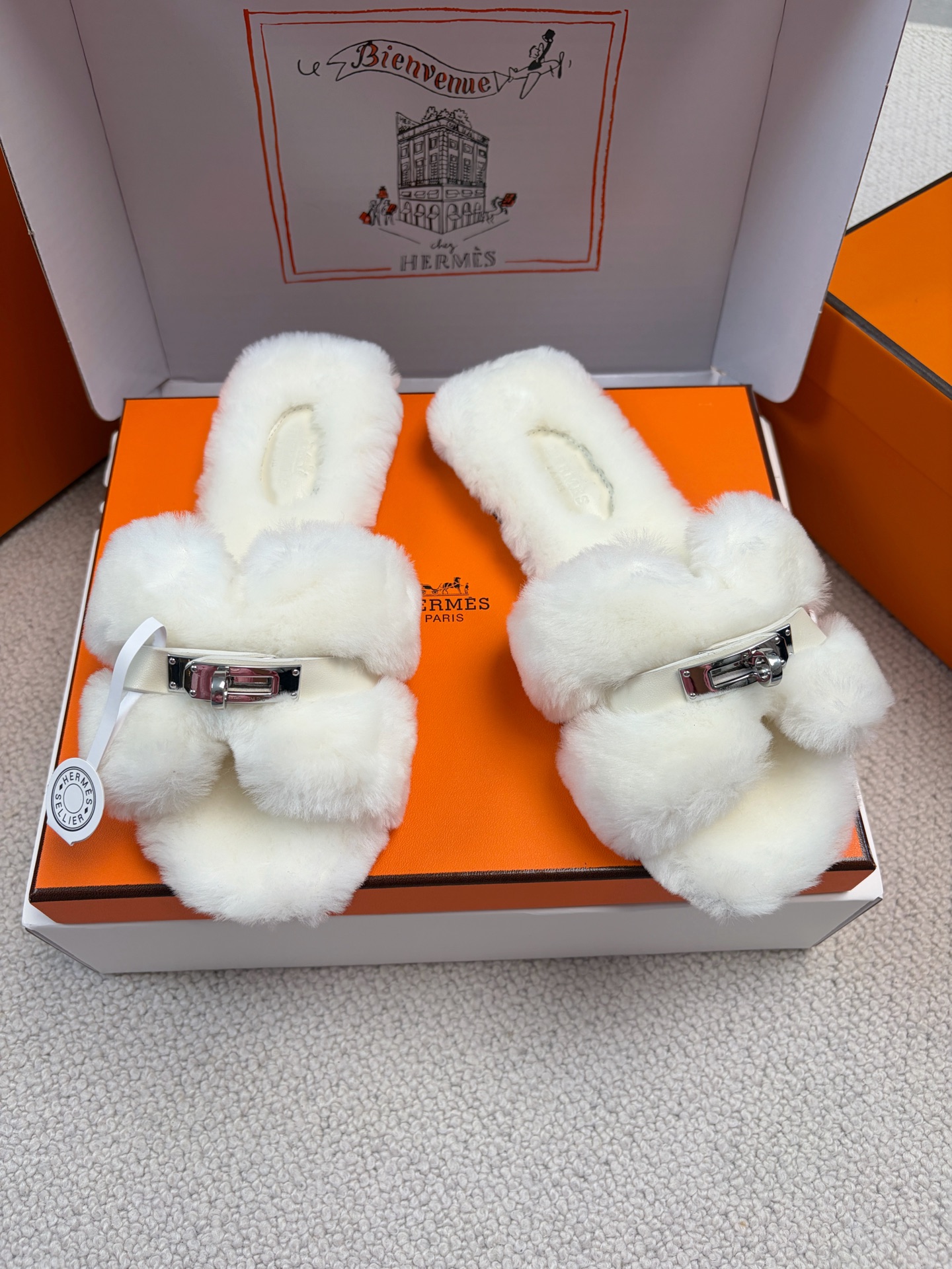 Hermès furry slippers
