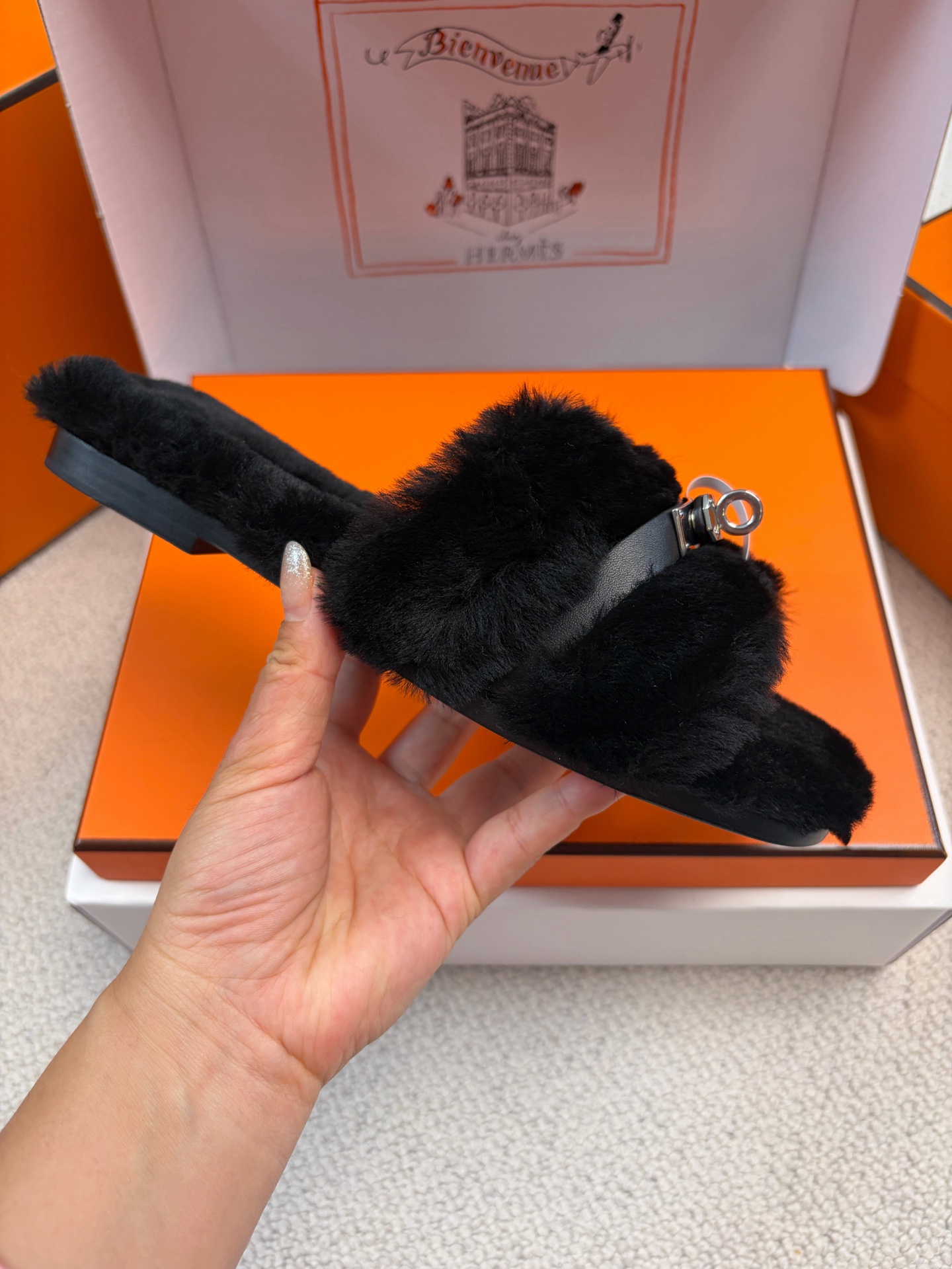 Hermès furry slippers