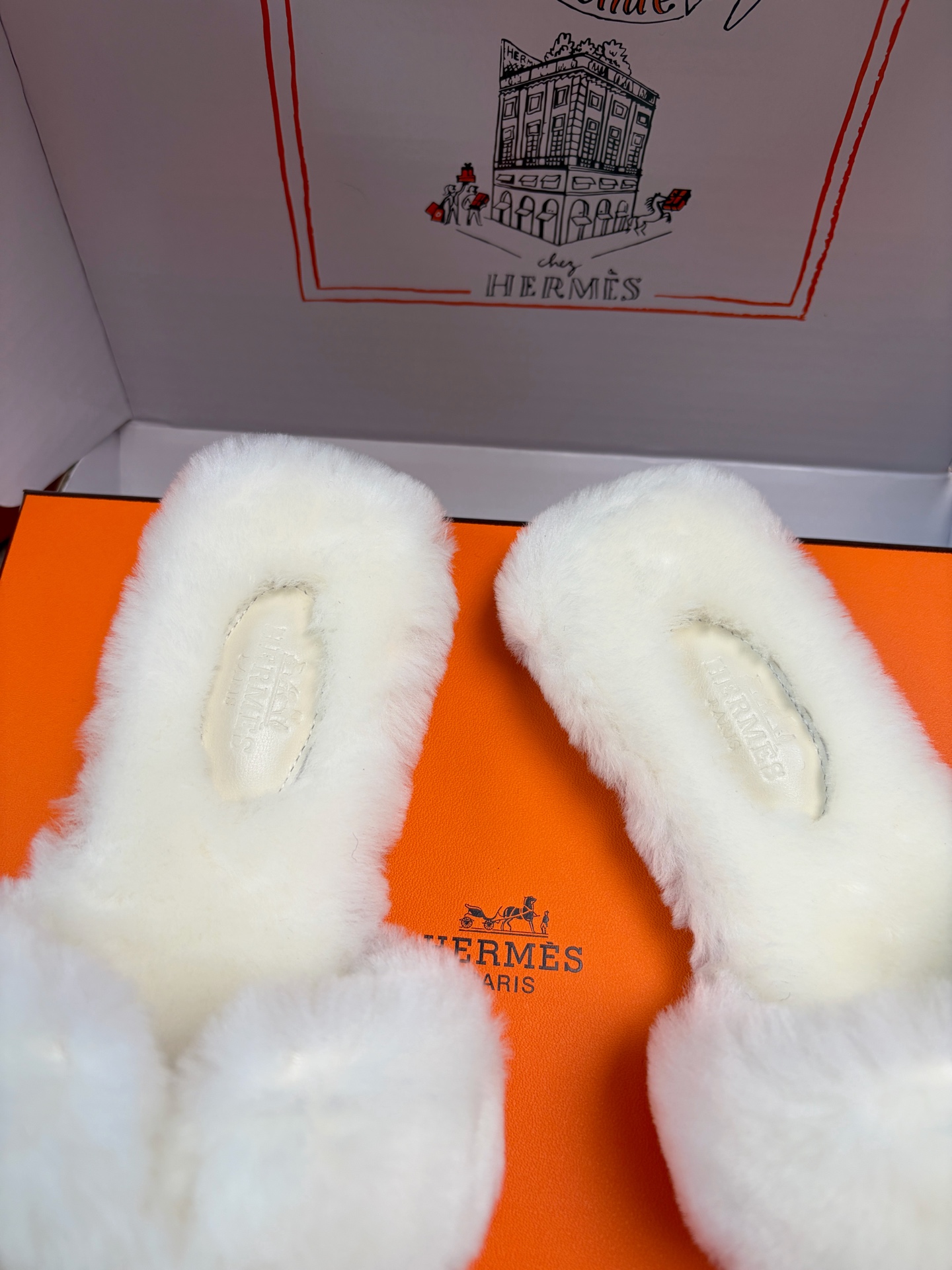 Hermès furry slippers