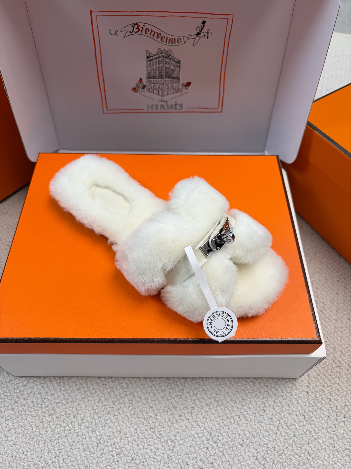 Hermès furry slippers
