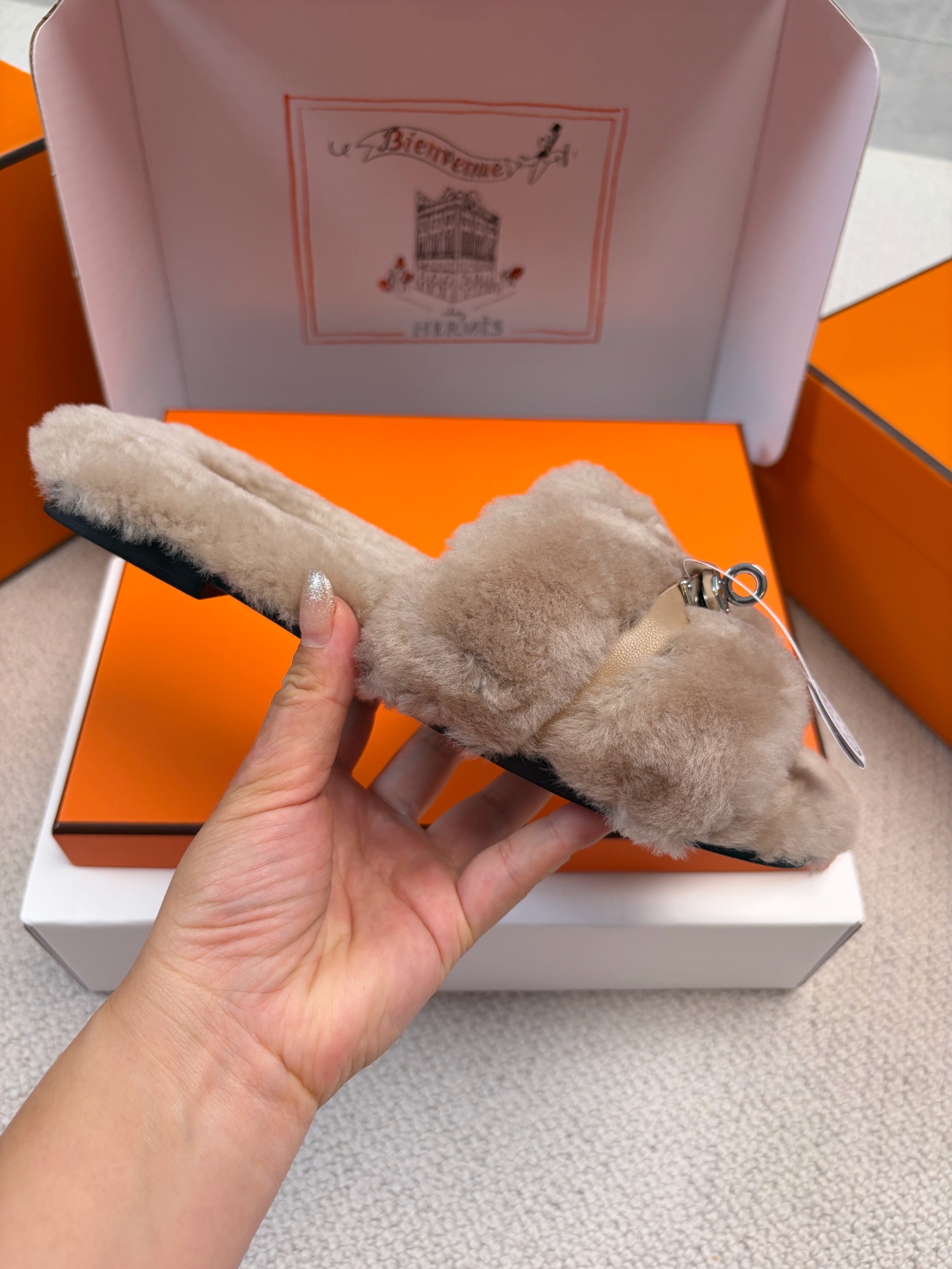 Hermès furry slippers