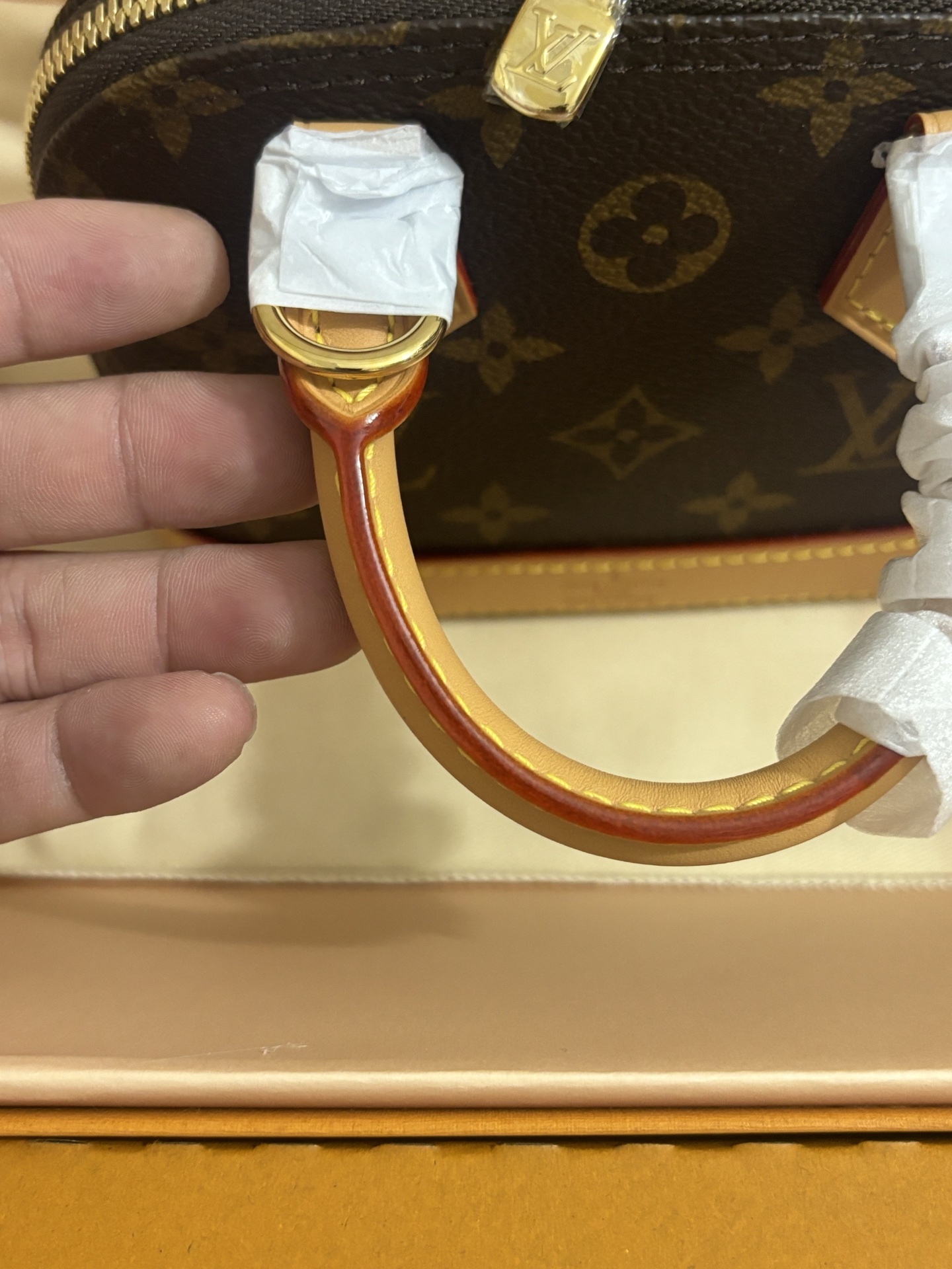 Louis Vuitton NANO ALMA Handbag