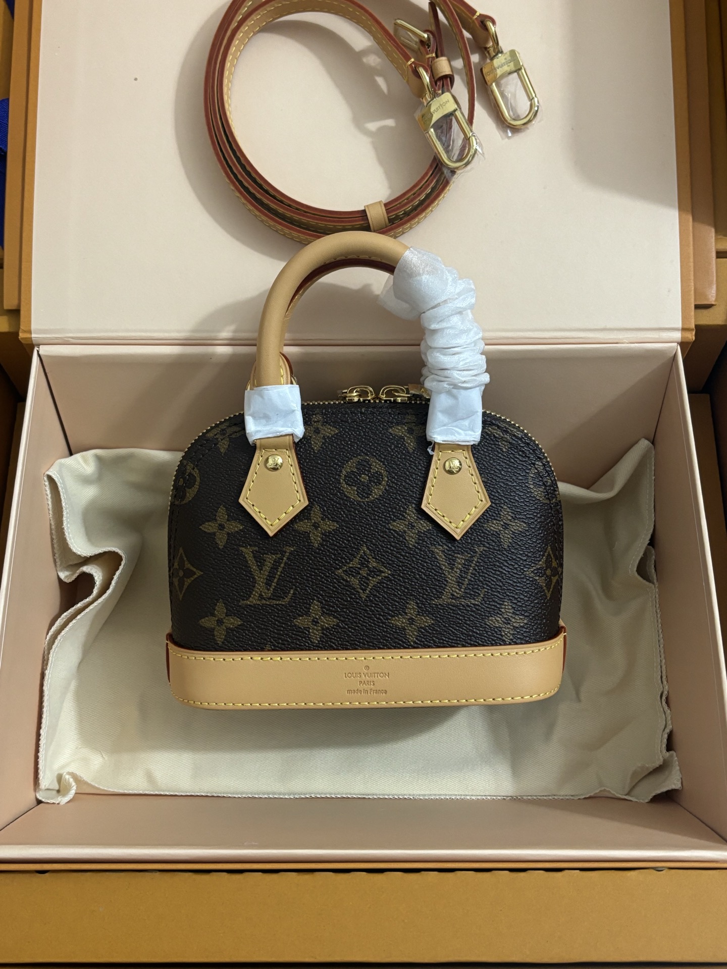 Louis Vuitton NANO ALMA Handbag