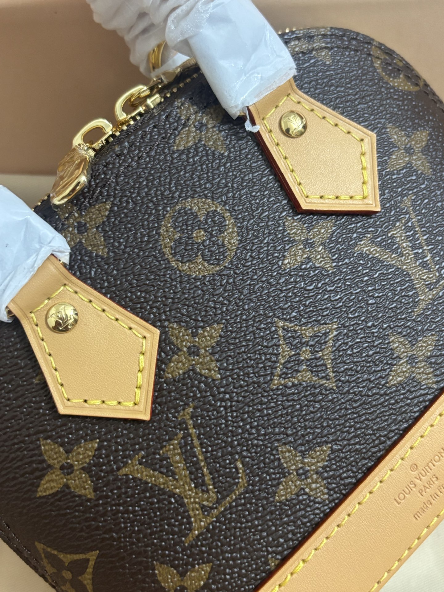 Louis Vuitton NANO ALMA Handbag