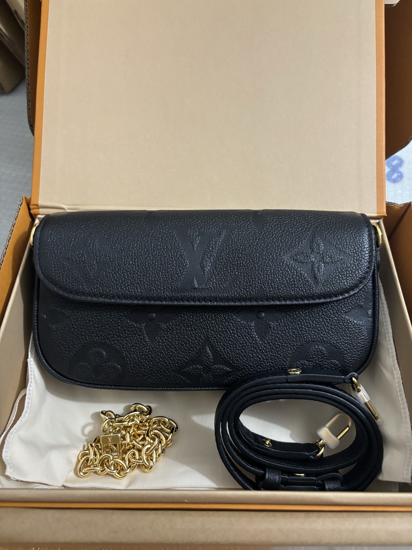Louis Vuitton Black embossed bag