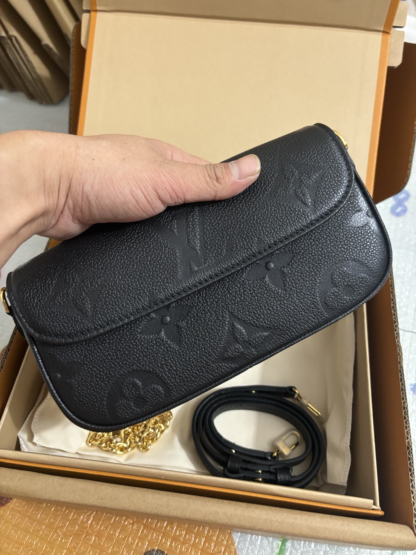 Louis Vuitton Black embossed bag