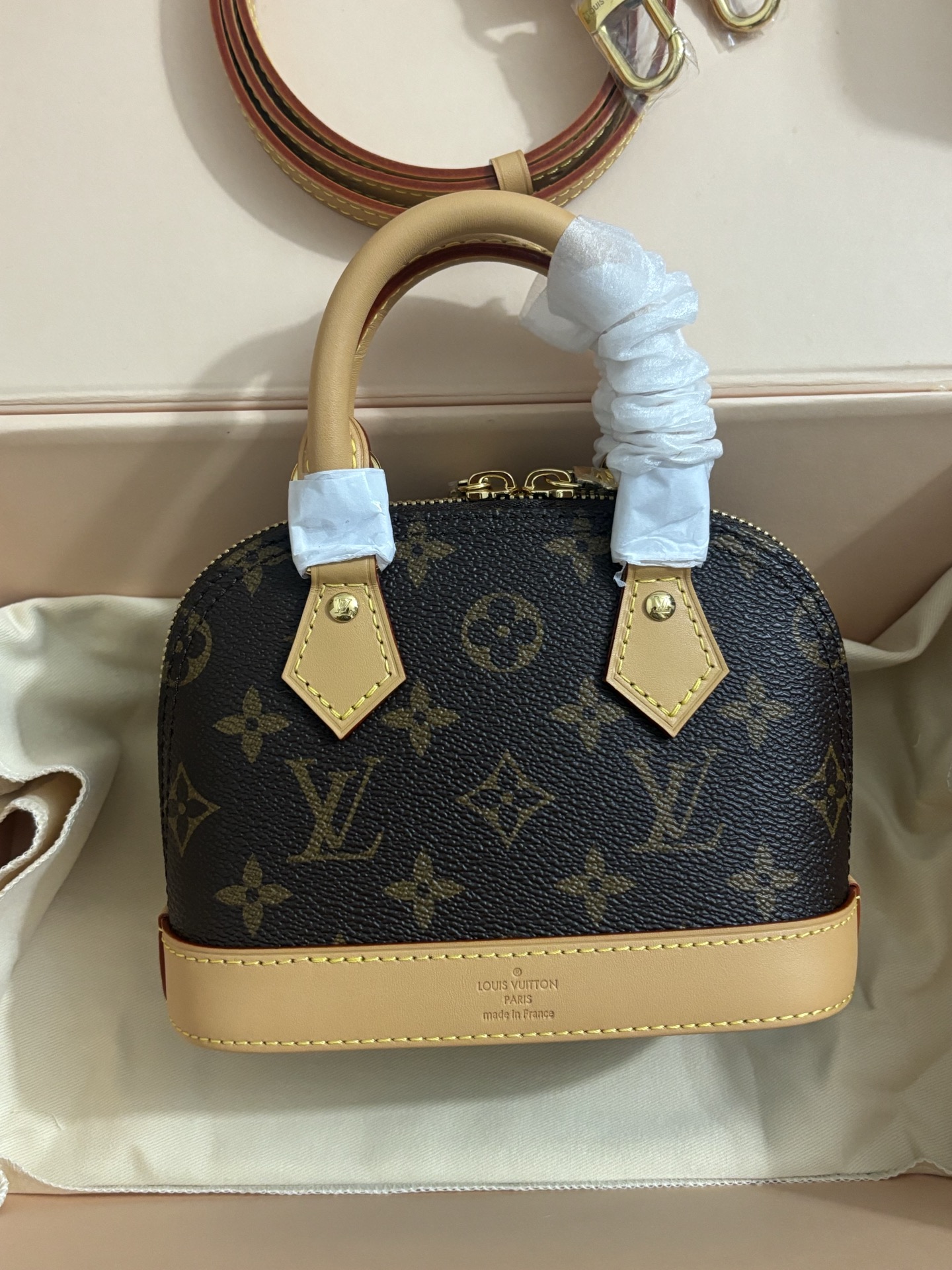 Louis Vuitton NANO ALMA Handbag