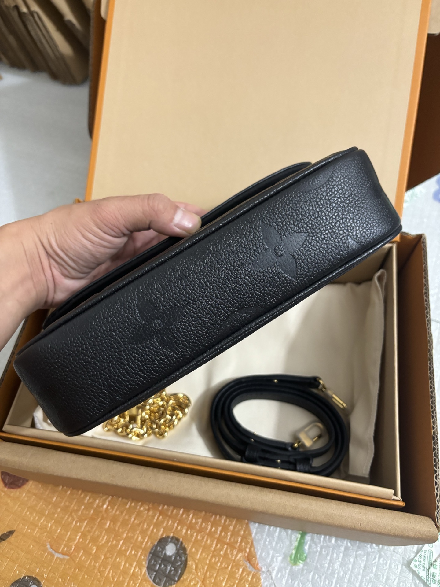 Louis Vuitton Black embossed bag
