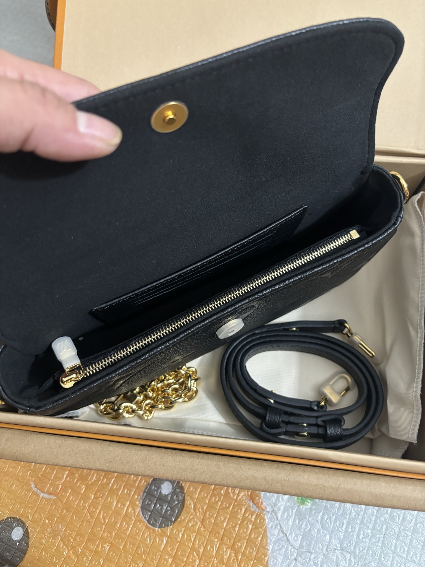 Louis Vuitton Black embossed bag