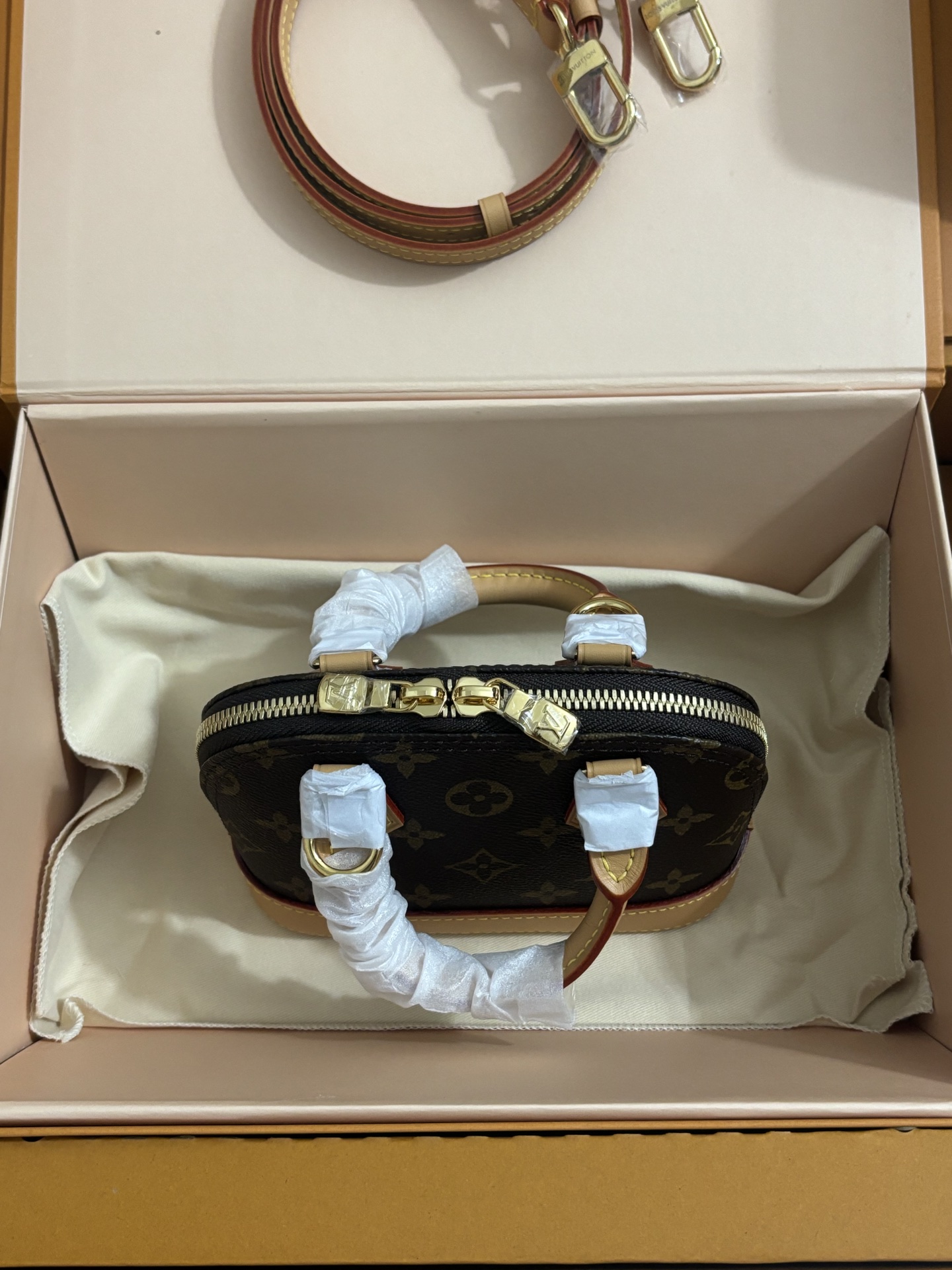 Louis Vuitton NANO ALMA Handbag