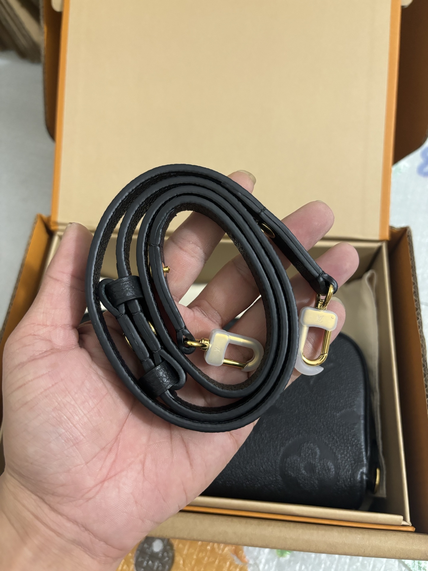 Louis Vuitton Black embossed bag