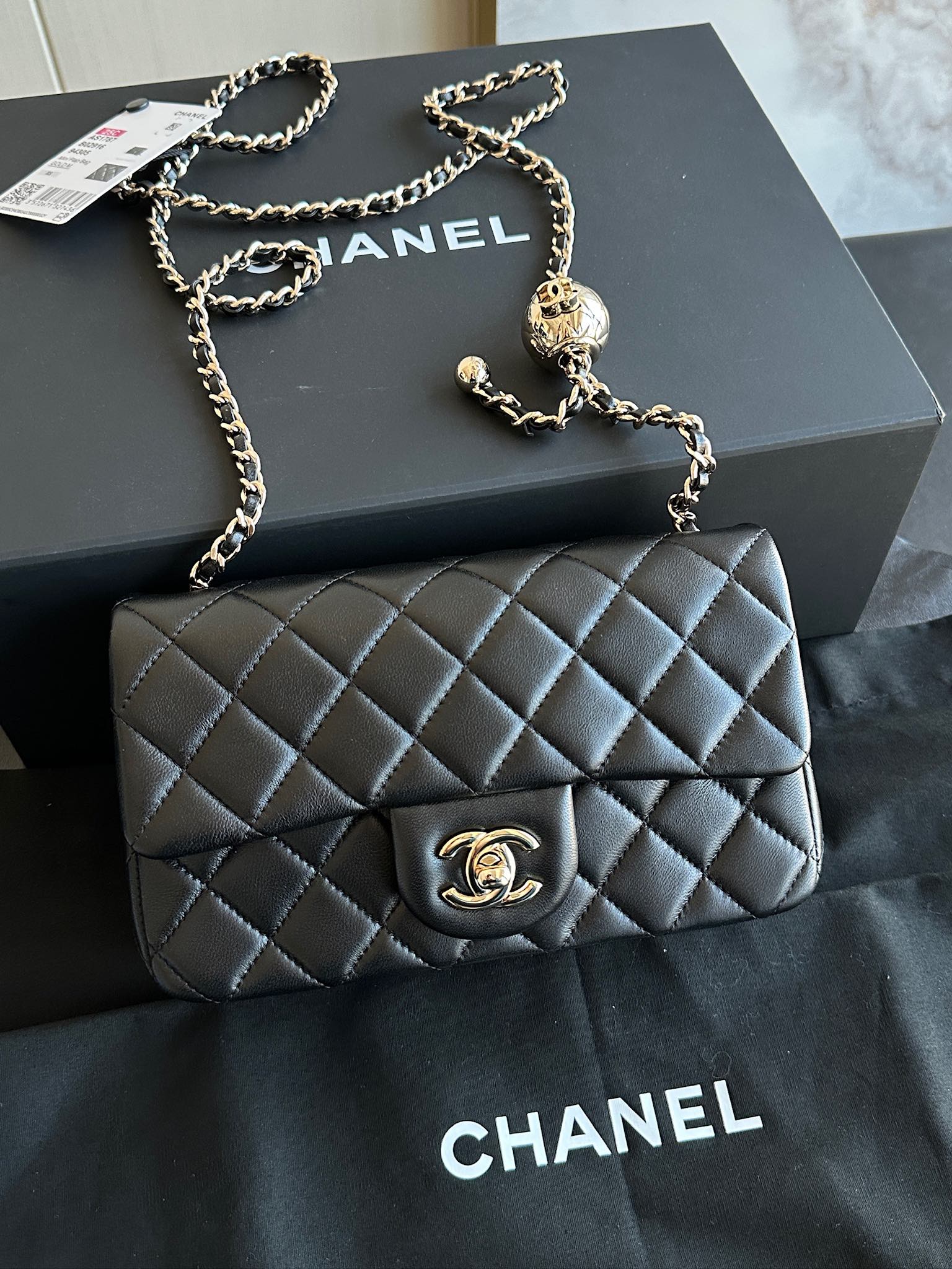 Chanel 25K gold ball large MINI Black