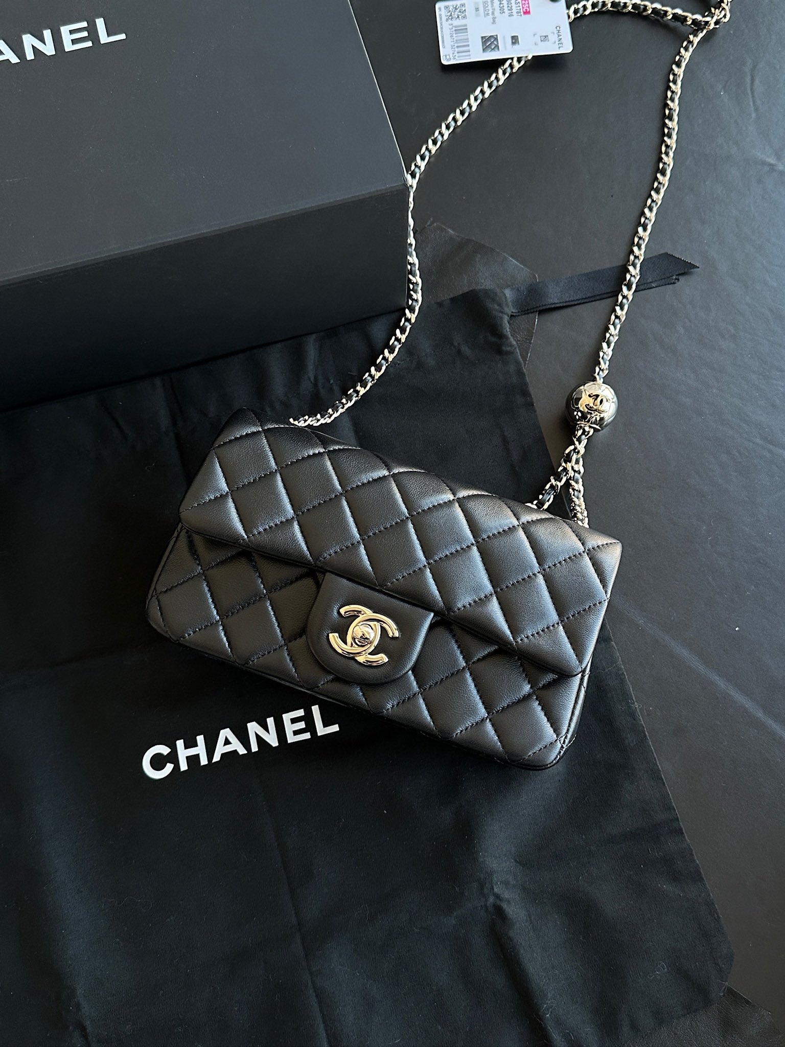 Chanel 25K gold ball large MINI Black