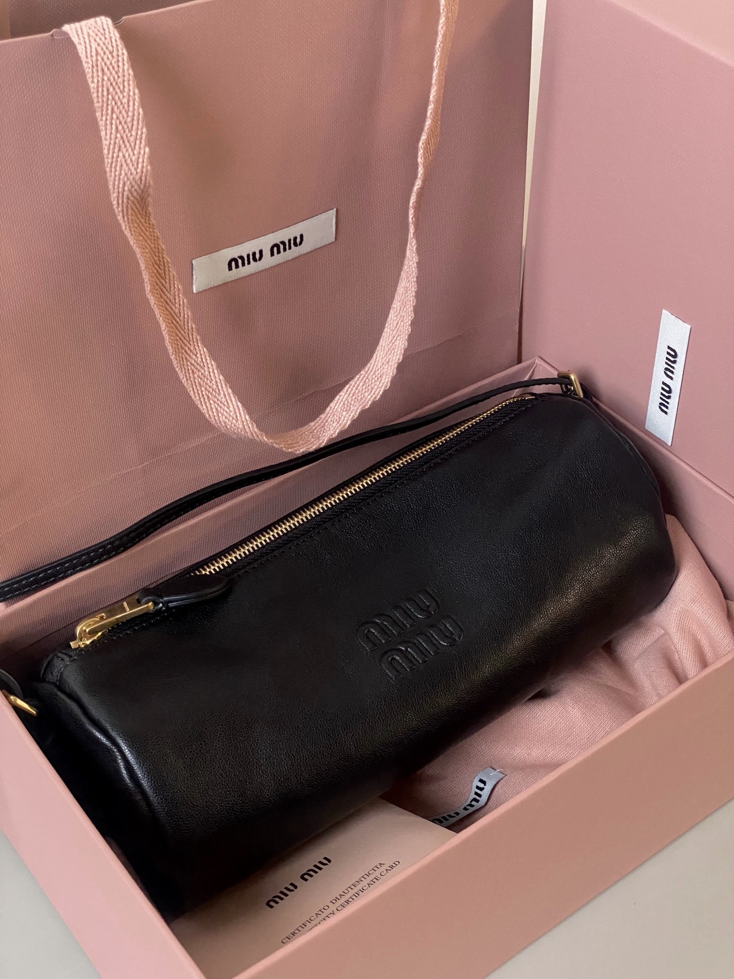 MiuMiu mini small cylindrical bag