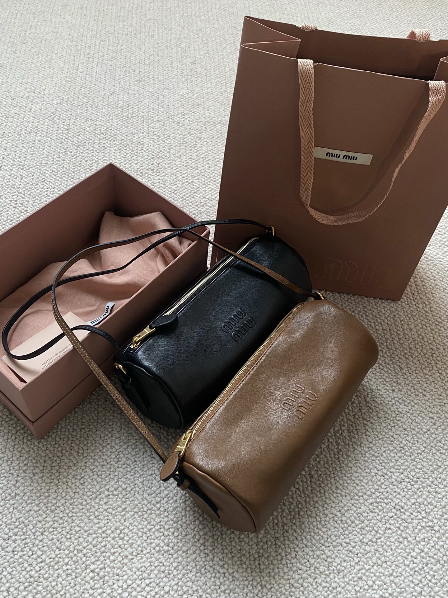 MiuMiu mini small cylindrical bag