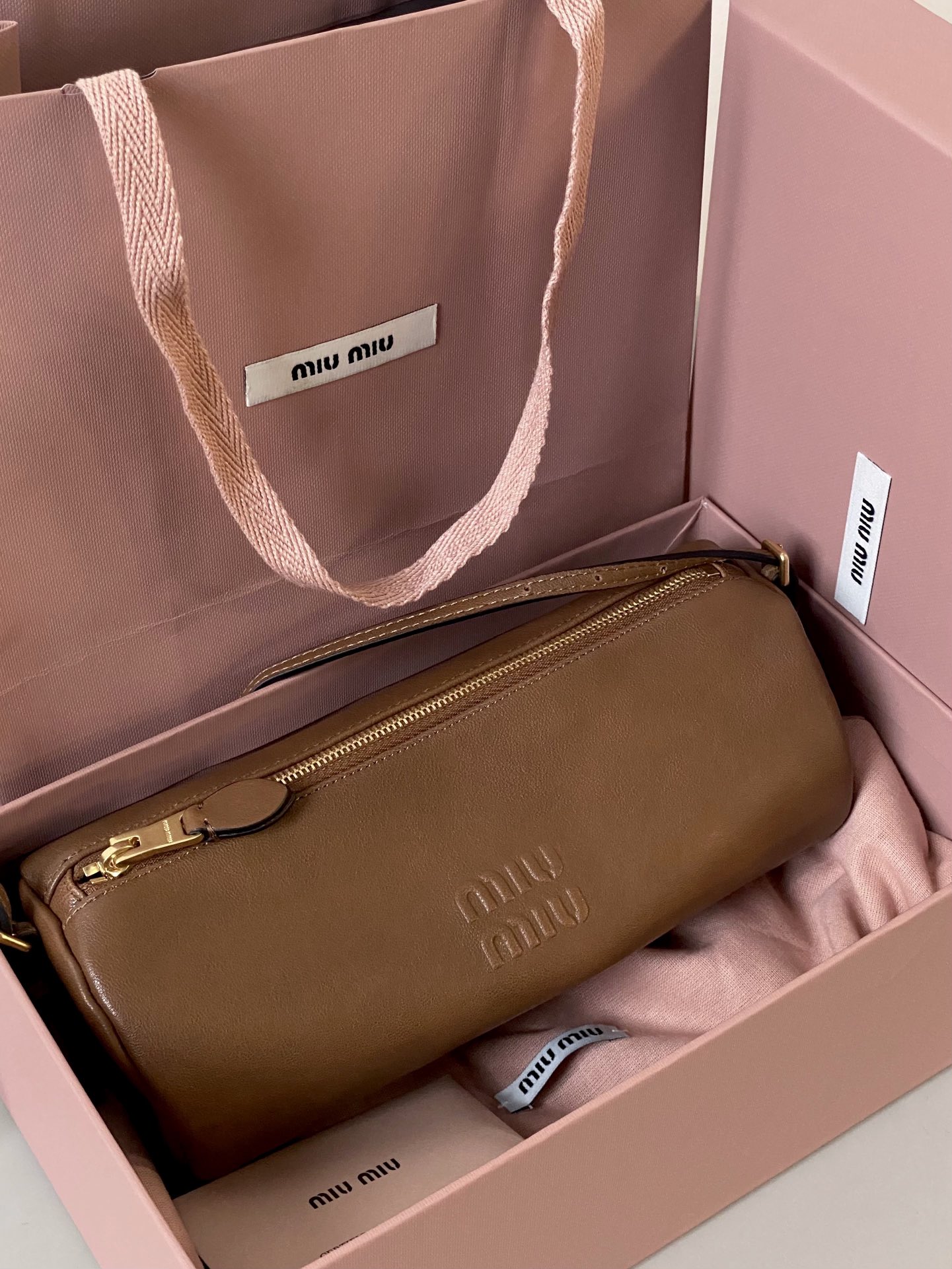 MiuMiu mini small cylindrical bag