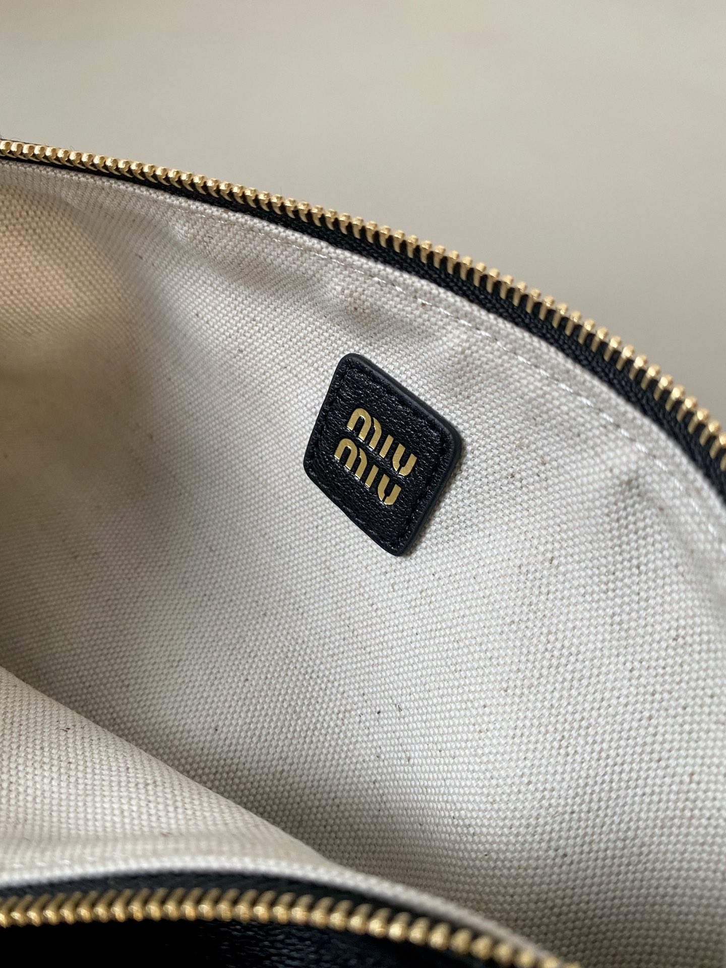 MiuMiu mini small cylindrical bag