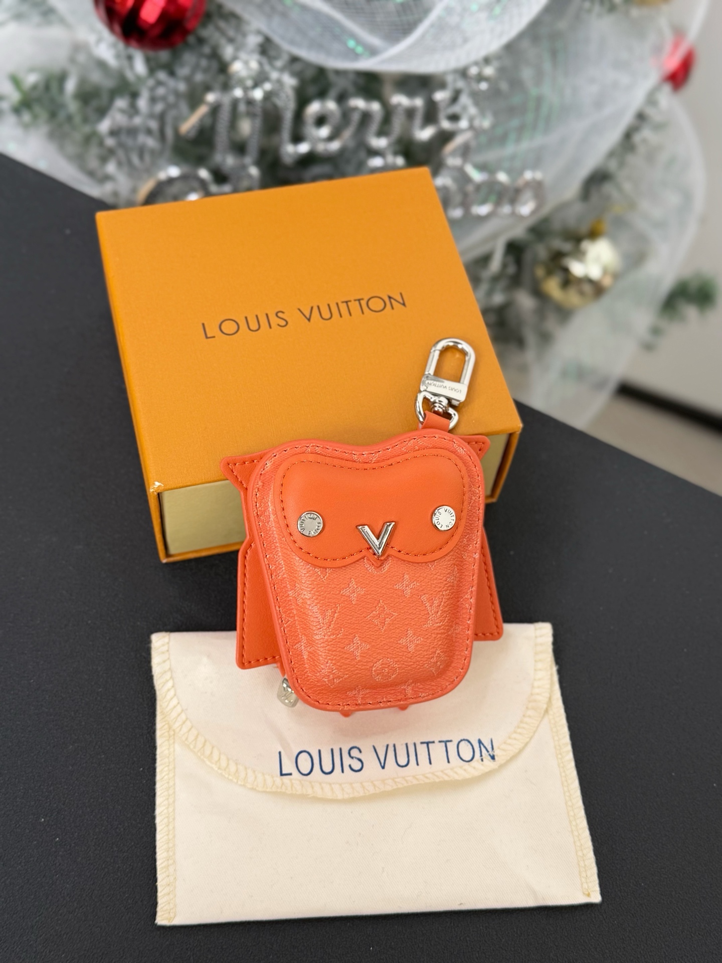 Louis Vuitton owl pendant