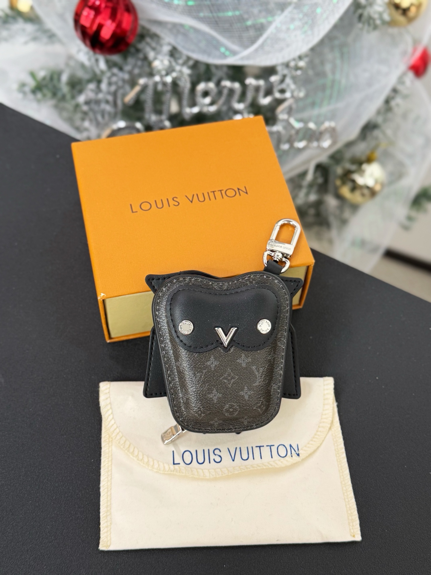 Louis Vuitton owl pendant