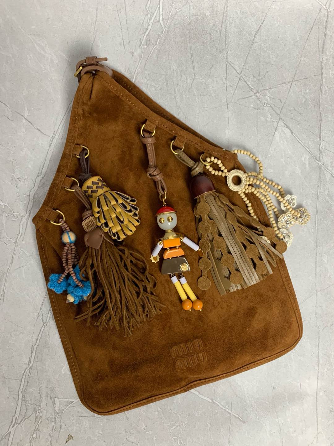 Miumiu 25SS limited edition suede charm bag