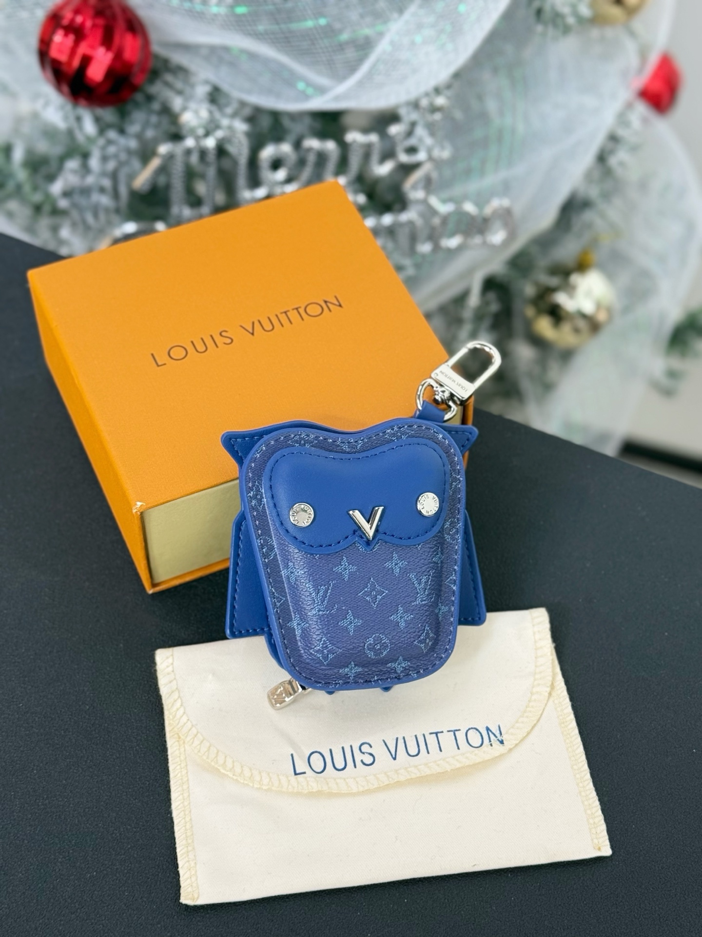 Louis Vuitton owl pendant