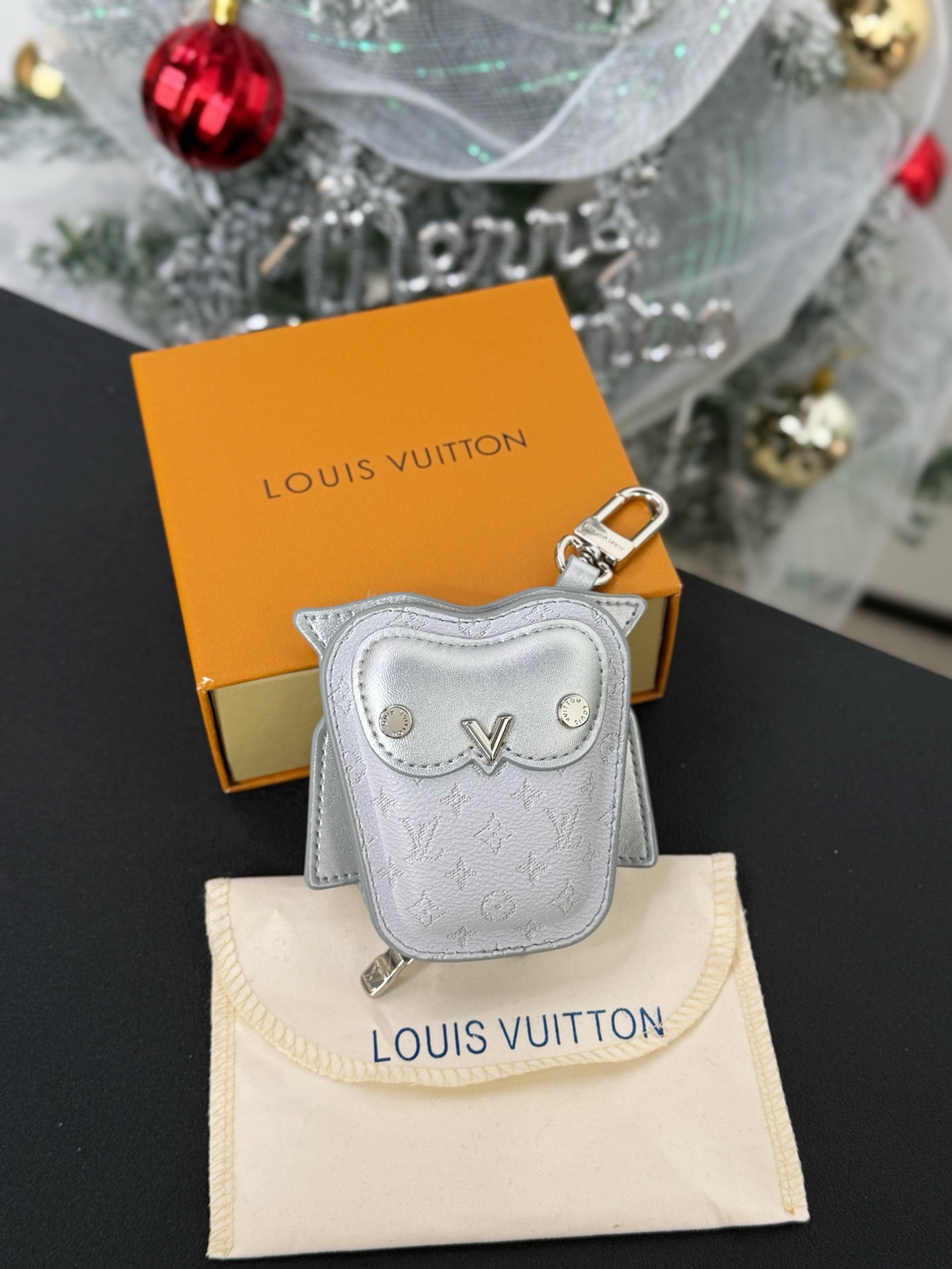 Louis Vuitton owl pendant