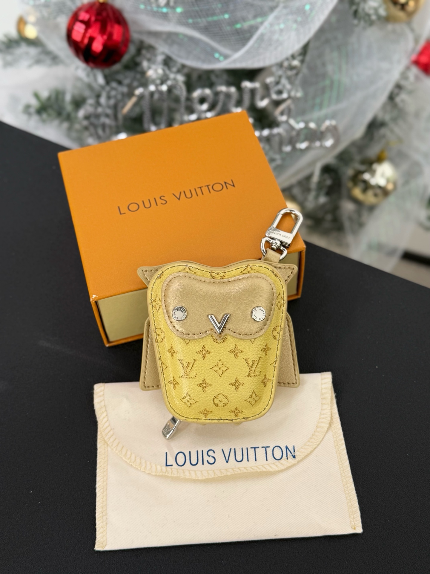 Louis Vuitton owl pendant